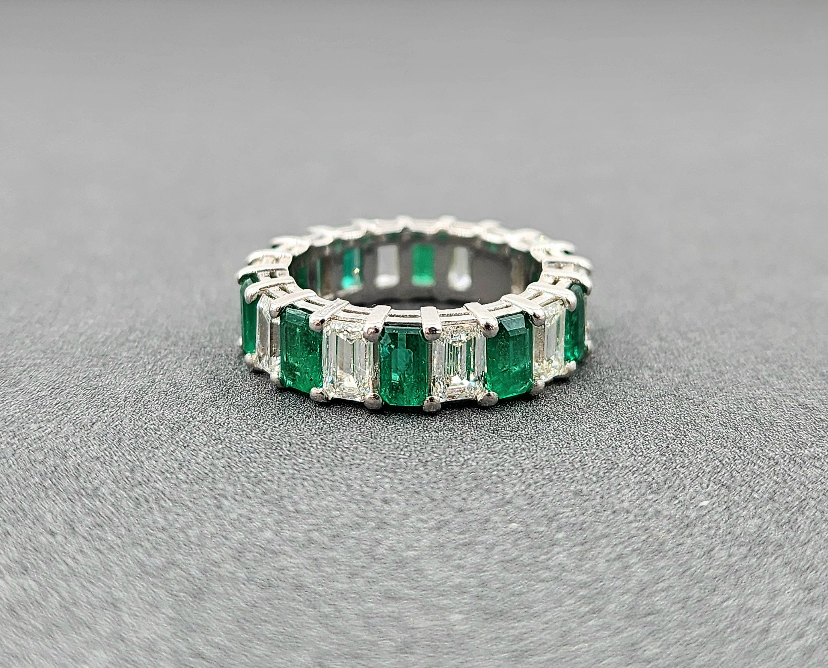 Exquisite 6.03 Carat Colombian Emerald & Diamond Eternity Band