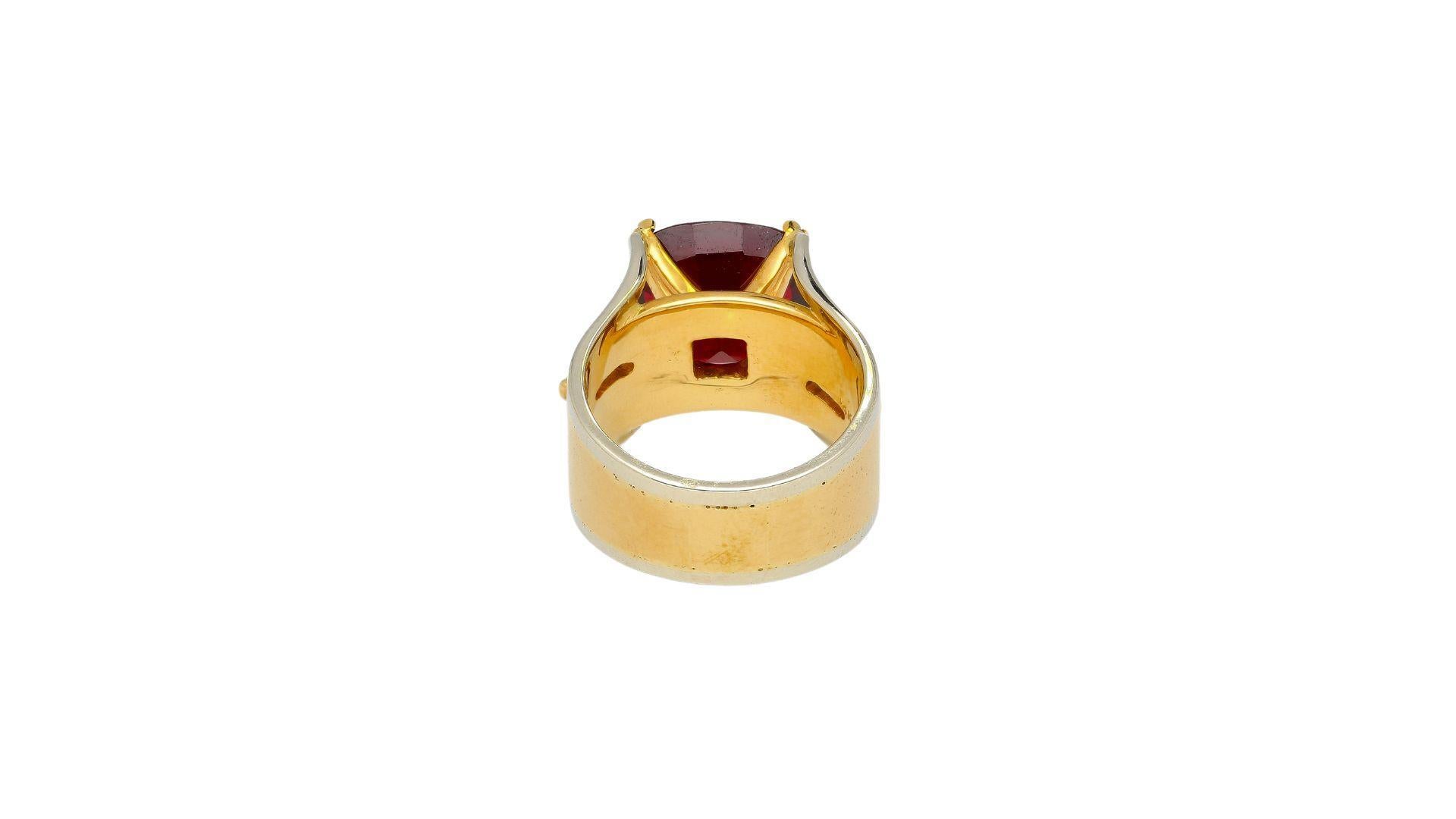 No Heat Burma Origin Spinel in Vintage 14K Gold Ring. 

This natural gemstone ring features a red spinel center stone. The spinel, has GIA certification, with no evidence of heat treatment and origins from Burma, Myanmar. It is paired with two