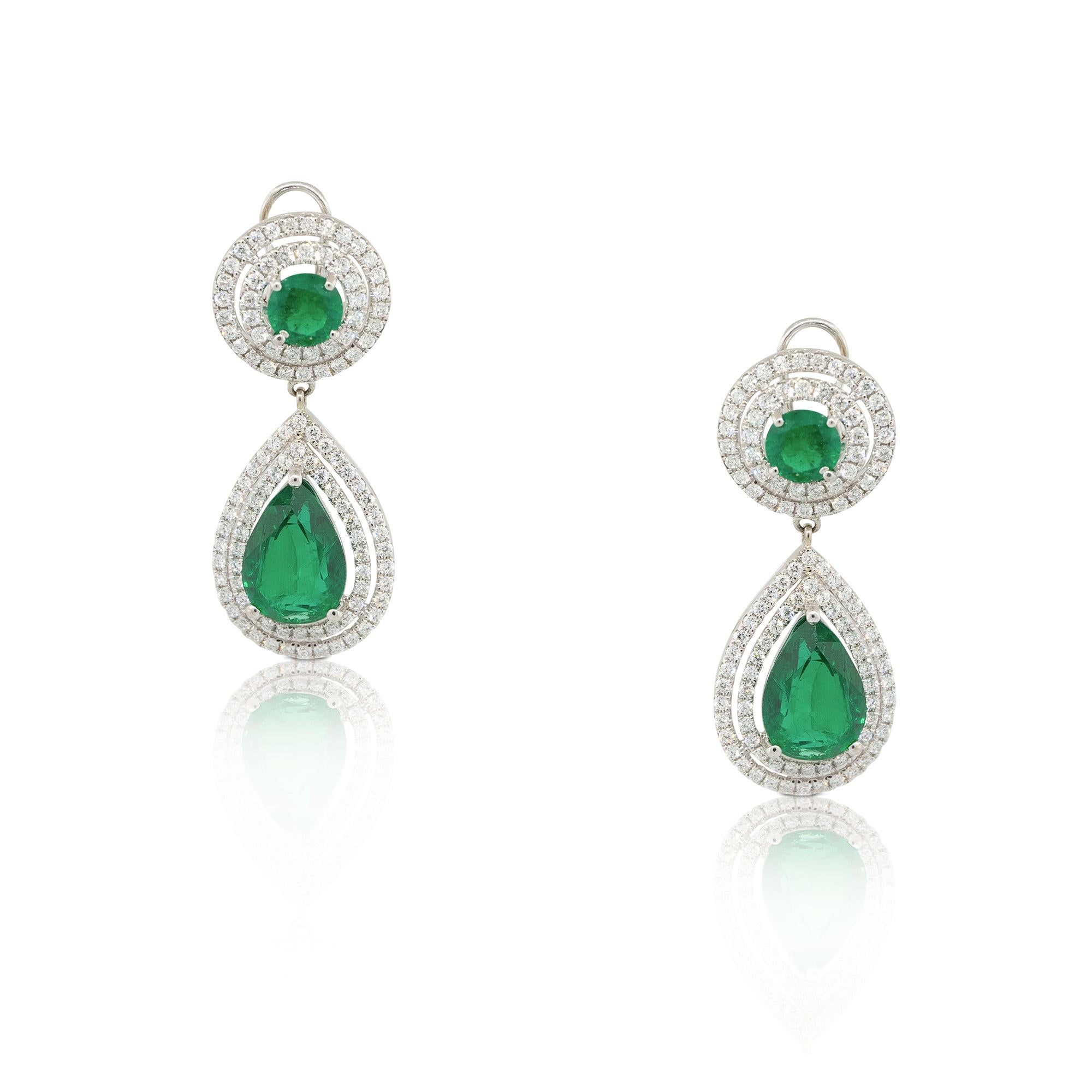 Material: 18k White Gold
Diamond/Stone Details: Approx. 6.04ctw of Round and Pear shaped Emeralds. Approx. 1.60ctw of Diamonds set in double halos. Diamonds are H/I in color and SI in clarity.
Total Weight: 3.4dwt 
Earring Backs: Omega