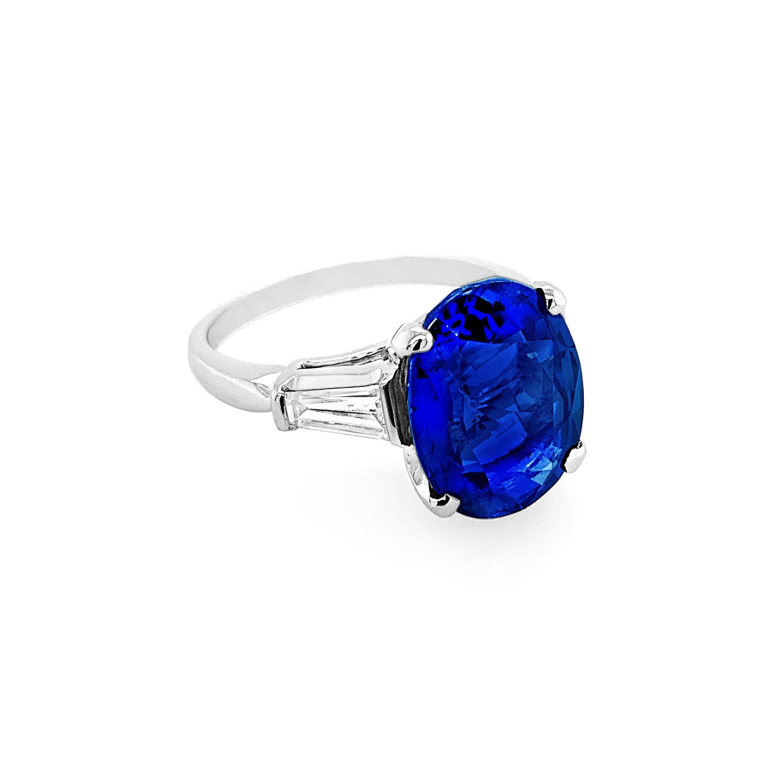 Oval Cut 6.04 Carat Oval Sapphire with Trapeze Side Diamonds in Platinum