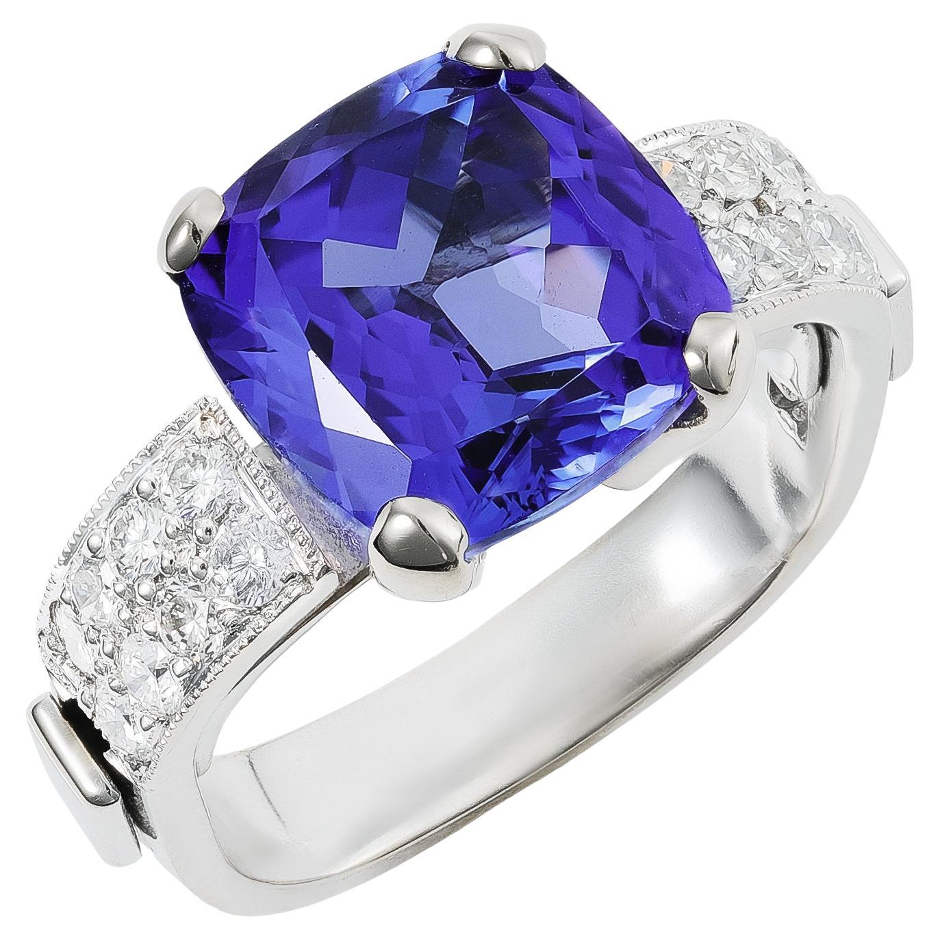 6.04 cts Natural Tanzanite 
0.60 cts Diamonds 18K White Gold Ring