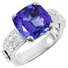 6.04 cts Natural Tanzanite 
0.60 cts Diamonds 18K White Gold Ring