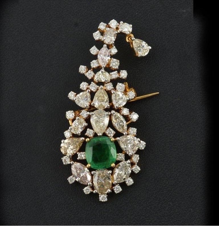 A stunning brooch set in 1.60 carats emerald and 6.05 carats of sparkling diamonds.

FOLLOW  MEGHNA JEWELS storefront to view the latest collection & exclusive pieces.  Meghna Jewels is proudly rated as a Top Seller on 1stdibs with 5 star customer