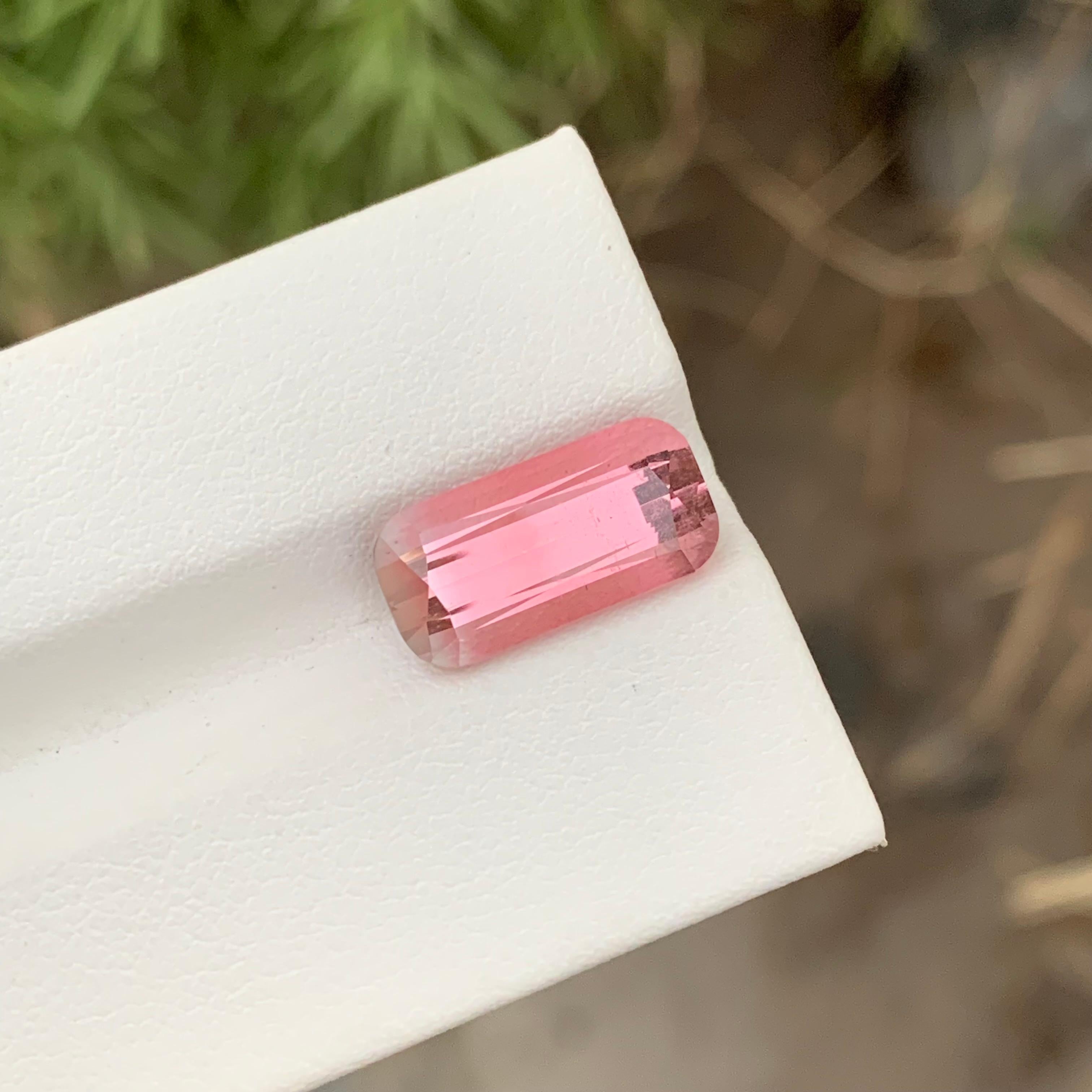 Loose Pink Tourmaline 
Weight: 6.05 Carats 
Dimension: 14.5 x 7.1 x 6.5 Mm 
Colour: Baby Pink 
Origin: Paprook Afghanistan 
Shape : Cushion
Certificate: On Demand 
Treatment: Non 

Pink tourmaline, known for its captivating hue ranging from delicate