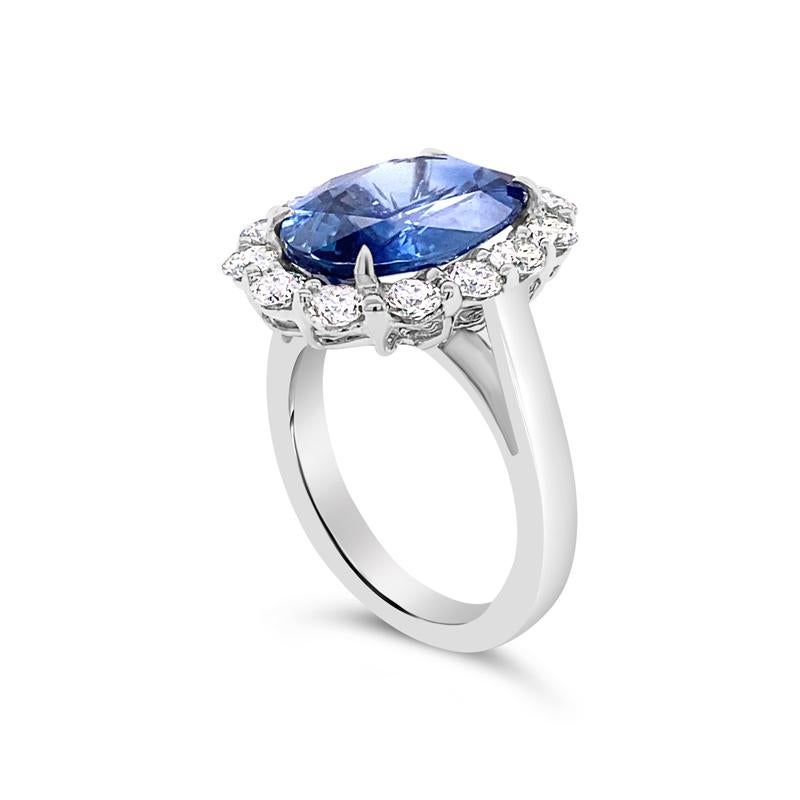 6.05 Carat Oval Cut Ceylon Sapphire with 1.40ctw Diamond Halo Cocktail Ring In New Condition For Sale In Houston, TX