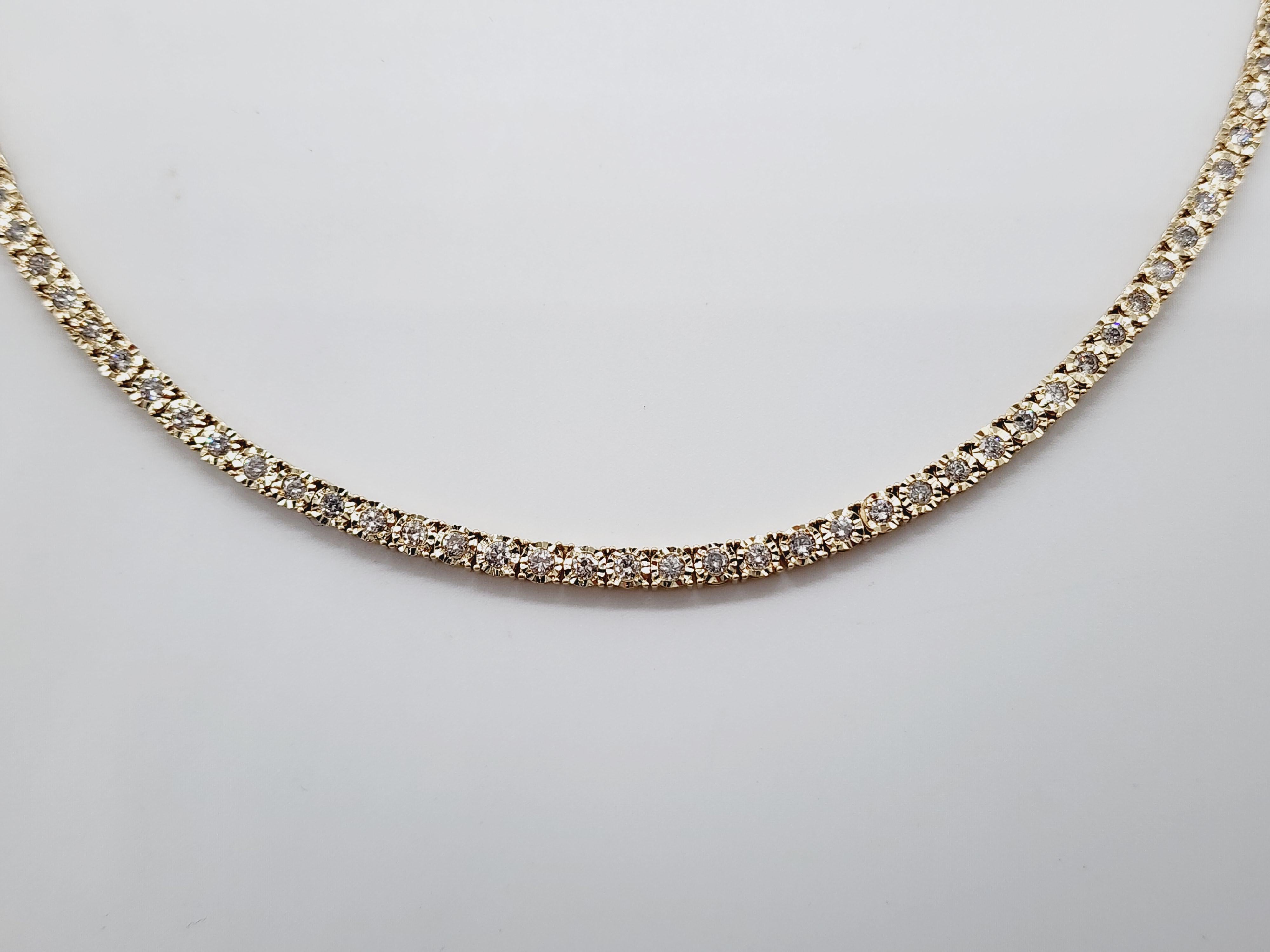 Brilliant and beautiful illusion setting necklace, natural round-brilliant cut white diamonds clean and Excellent shine. 14k yellow gold illusion setting four-prong for maximum light brilliance. 20 inch length. Average F-G Color, SI-I  Clarity.