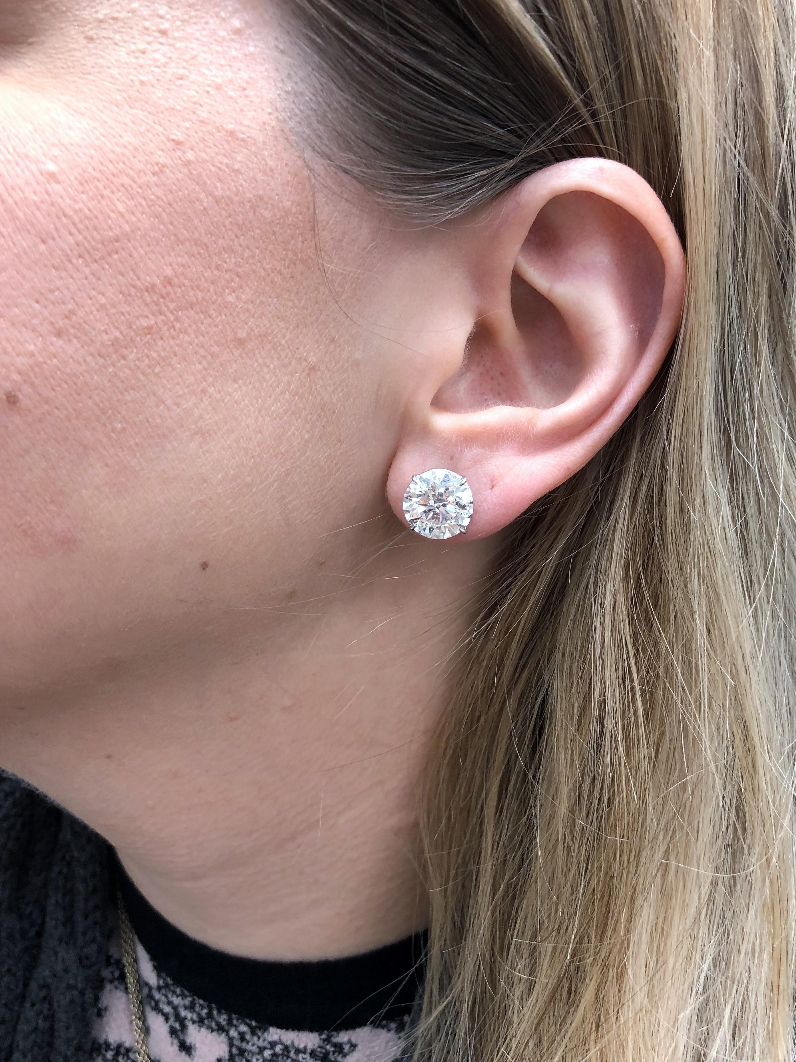 Round Cut 6.05 Carat Diamond Stud Earrings For Sale