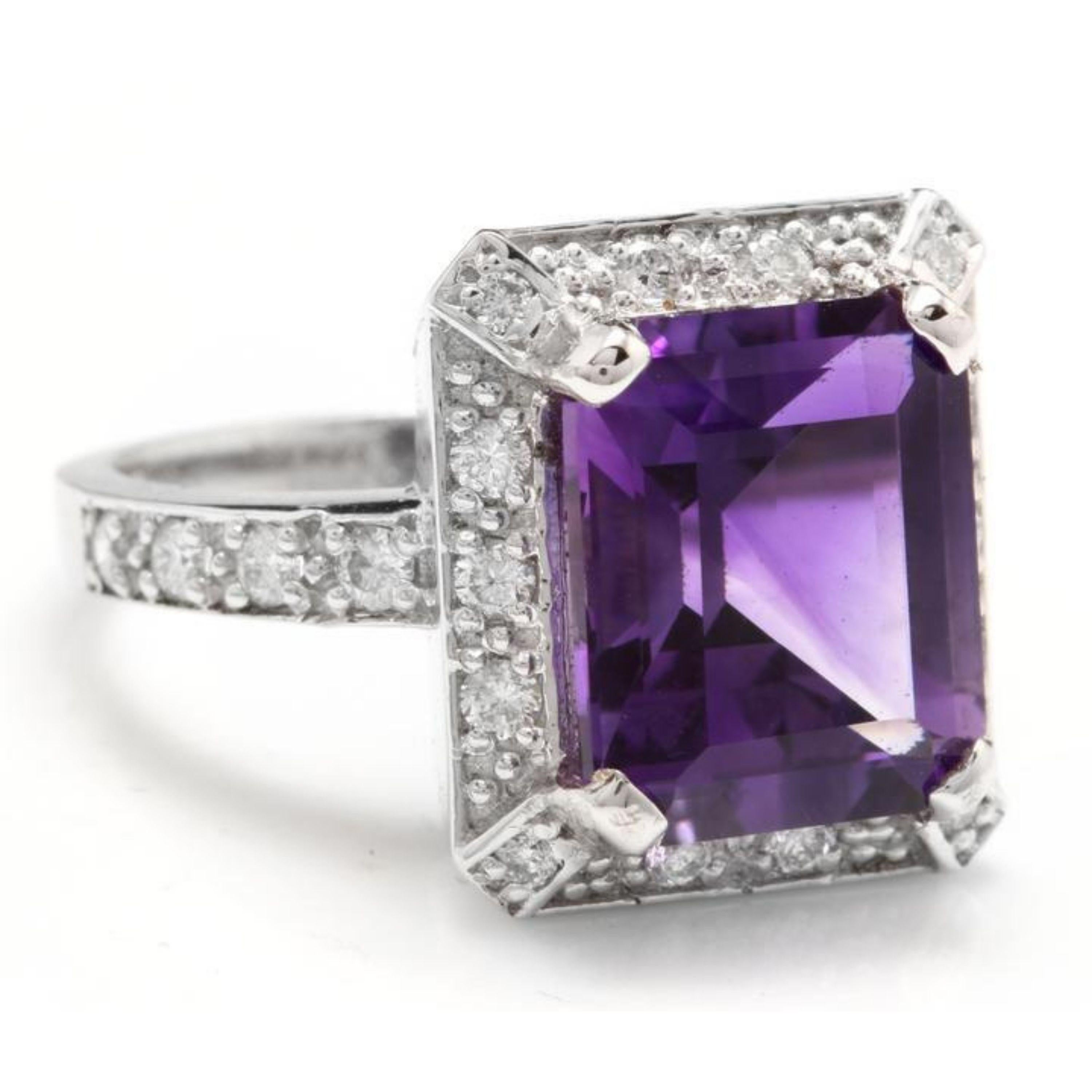 6.05 Carats Impressive Natural Amethyst and Diamond 14K White Gold Ring

Total Natural Amethyst Weight is: Approx. 5.50 Carats

Amethyst Measures: Approx. 12.00 x 10.00mm

Natural Round Diamonds Weight: Approx. 0.55 Carats (color G-H / Clarity