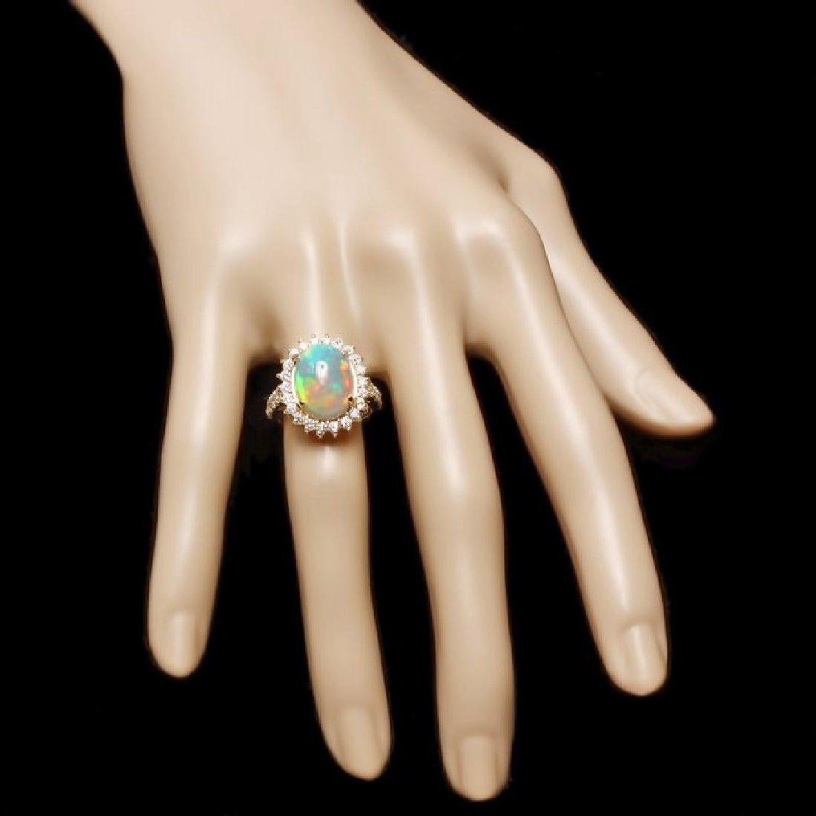 Mixed Cut 6.05 Ct Natural Impressive Ethiopian Opal and Diamond 14 Karat Solid Gold Ring For Sale