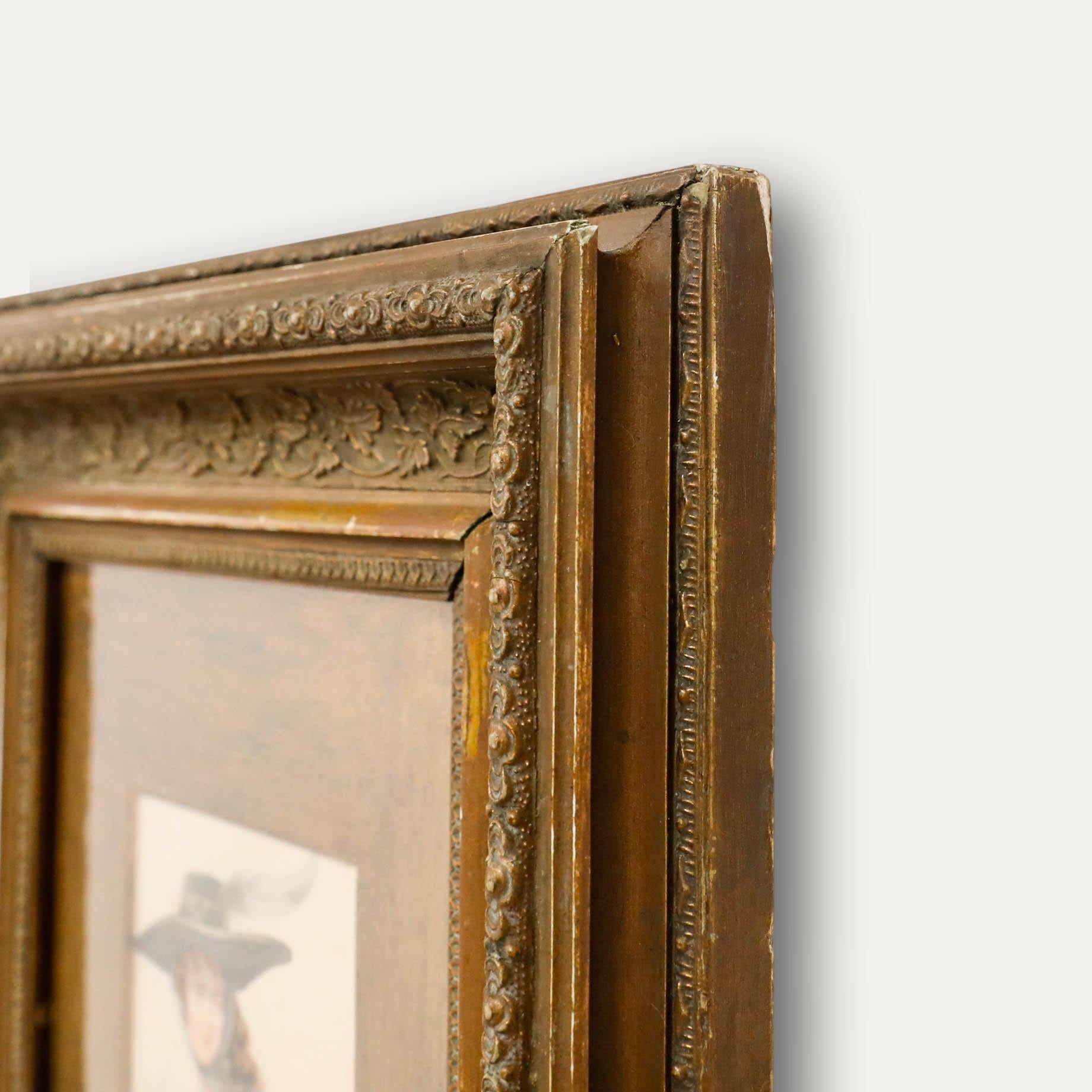 Eine Dame in modischer Kleidung hält eine Maiglöckchenblüte in diesem fein detaillierten Aquarell- und Graphitporträt. Signiert unten links. Präsentiert in einem vergoldeten Rahmen mit Blattwerk und Sonnenmotiv. Auf dem Papier. Bildgröße: 12 x 10,5