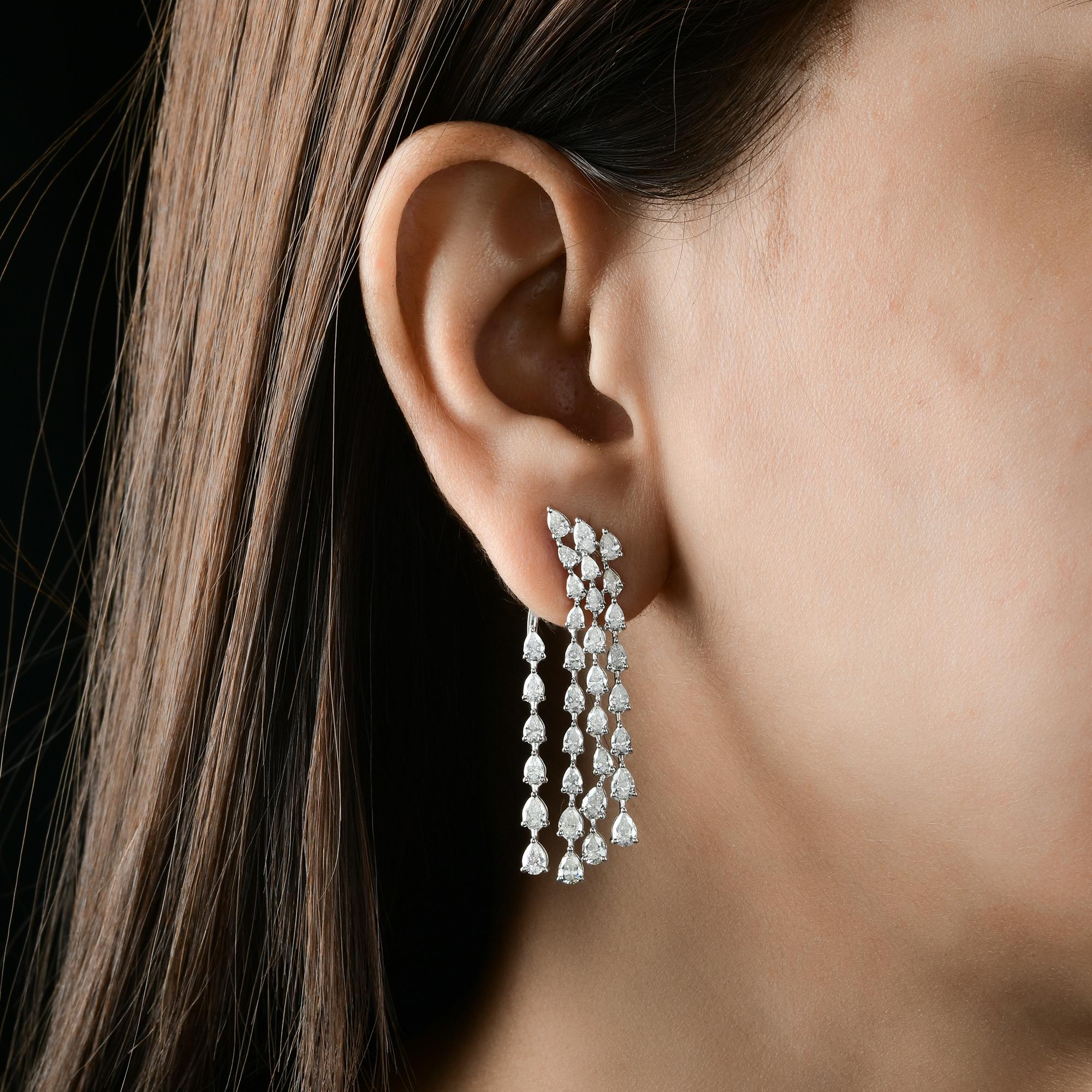 6.05Ct SI/H Diamond Jacket Drop Earrings in 14k White Gold Handmade Jewelry
Ces boucles d'oreilles gouttes de diamants en cascade, conçues dans une silhouette gracieuse à plusieurs rangs, présentent des diamants taille poire scintillants.
Les