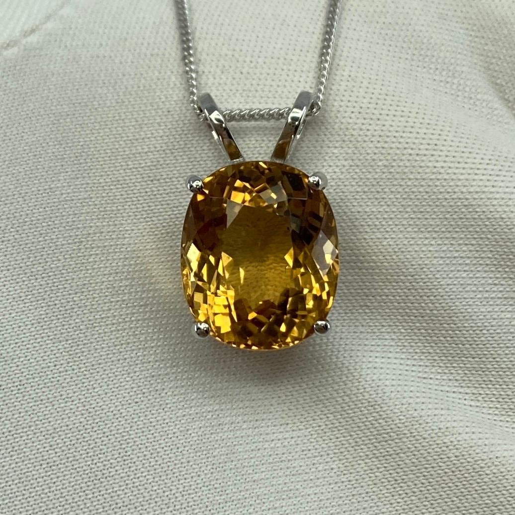 Vivid Golden Yellow Heliodor Beryl Oval Cut 18k White Gold Pendant.

6.05 Carat heliodor with a beautiful vivid golden yellow colour and excellent clarity, very clean stone, practically flawless. Also has an excellent oval cut showing lots of light