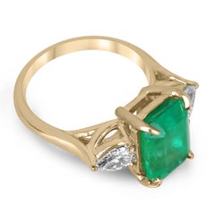 6.05tcw 18K Vivid Emerald Cut Colombian Emerald & Pear Diamond 3 Stone Gold Ring