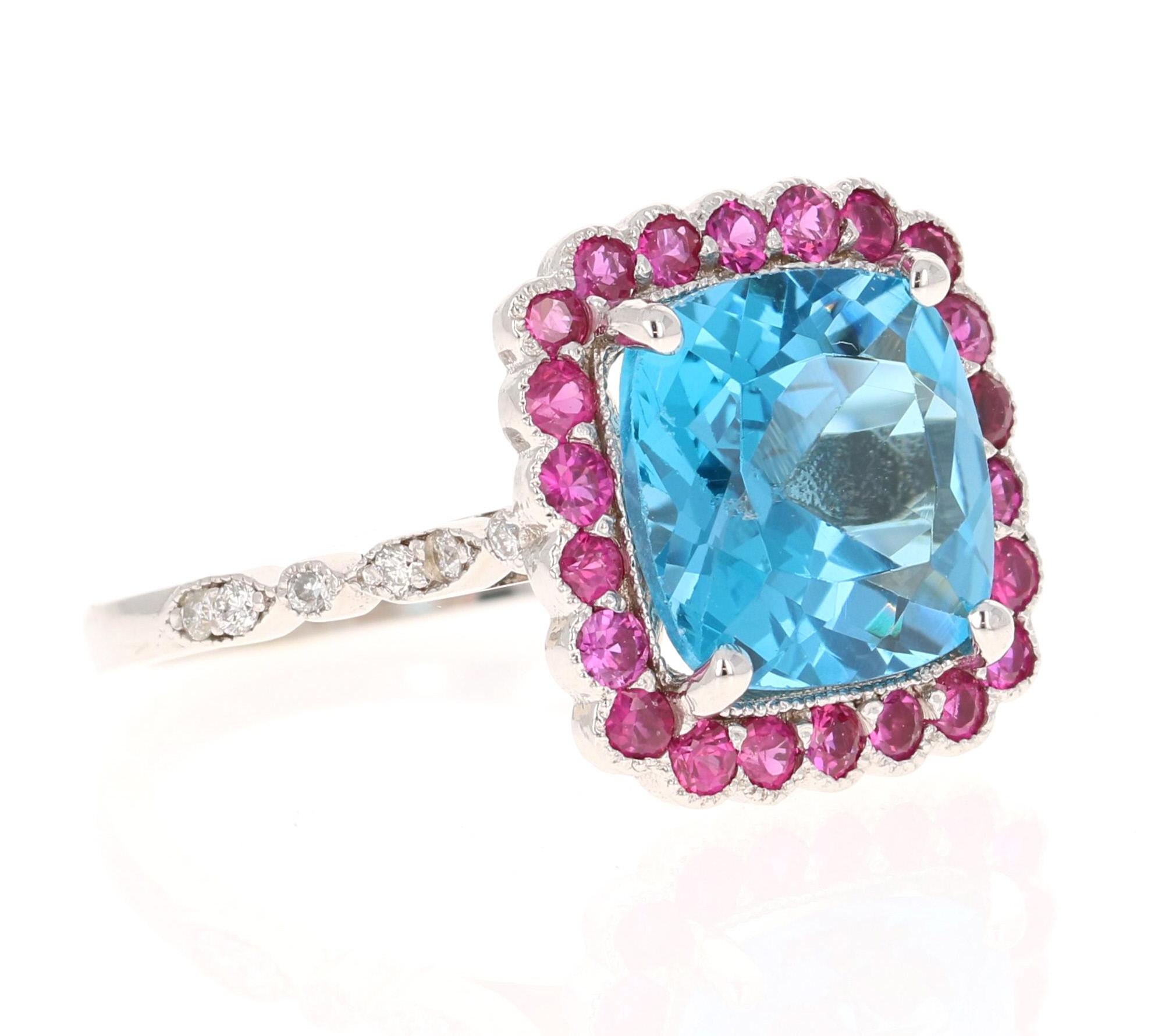 6.06 Carat Blue Topaz Pink Sapphire Diamond White Gold Engagement Ring

This ring has a magnificent Cushion Cut Blue Topaz that weighs 5.11 carats and is surrounded by 22 Round Cut Pink Sapphires that weigh 0.83 carats and 12 Round Cut Diamonds
