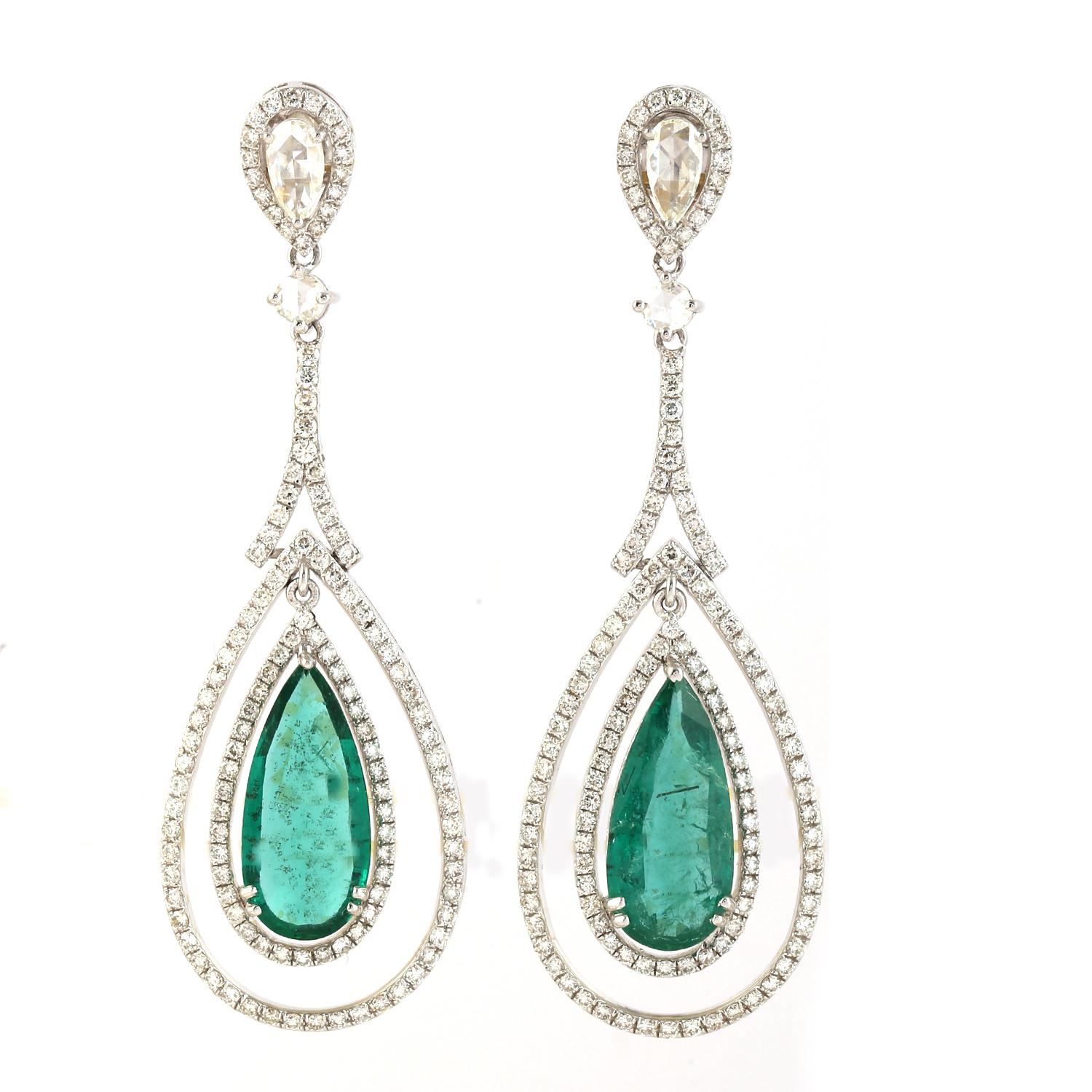 Contemporary 6.06ct pear Shaped Emerald Dangle Earrings Encircled In Diamonds In 18k Gold For Sale