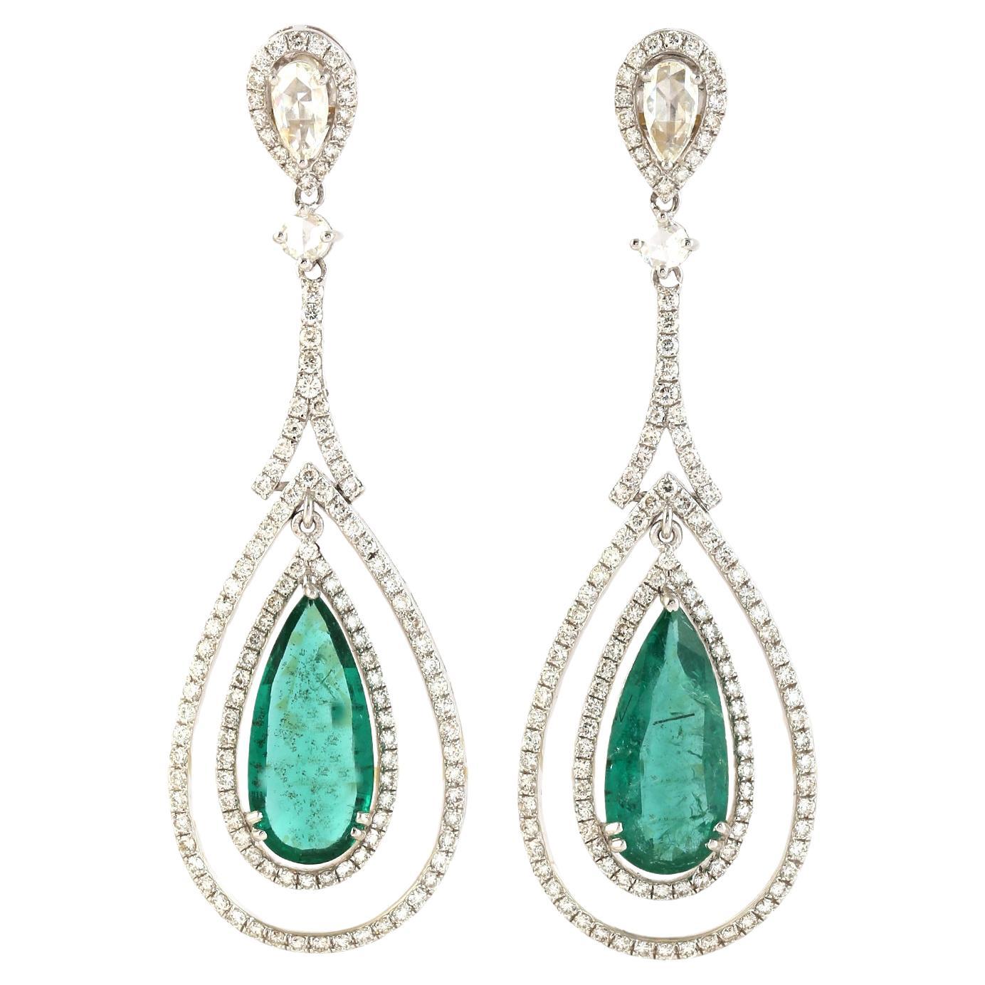 6.06ct pear Shaped Emerald Dangle Earrings Encircled In Diamonds In 18k Gold For Sale
