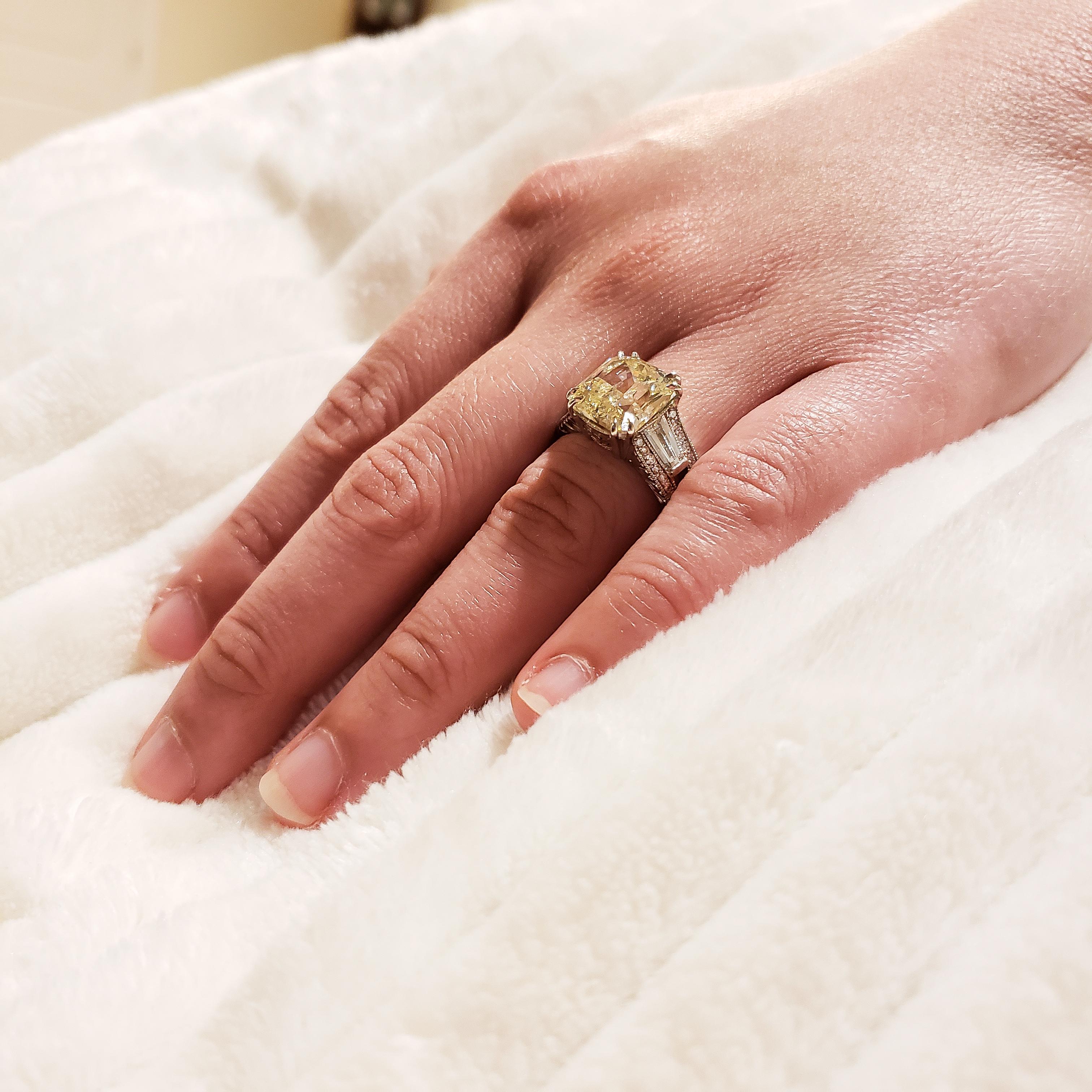 6.07 Carat Radiant Cut Yellow Diamond Three-Stone Engagement Ring For Sale 1