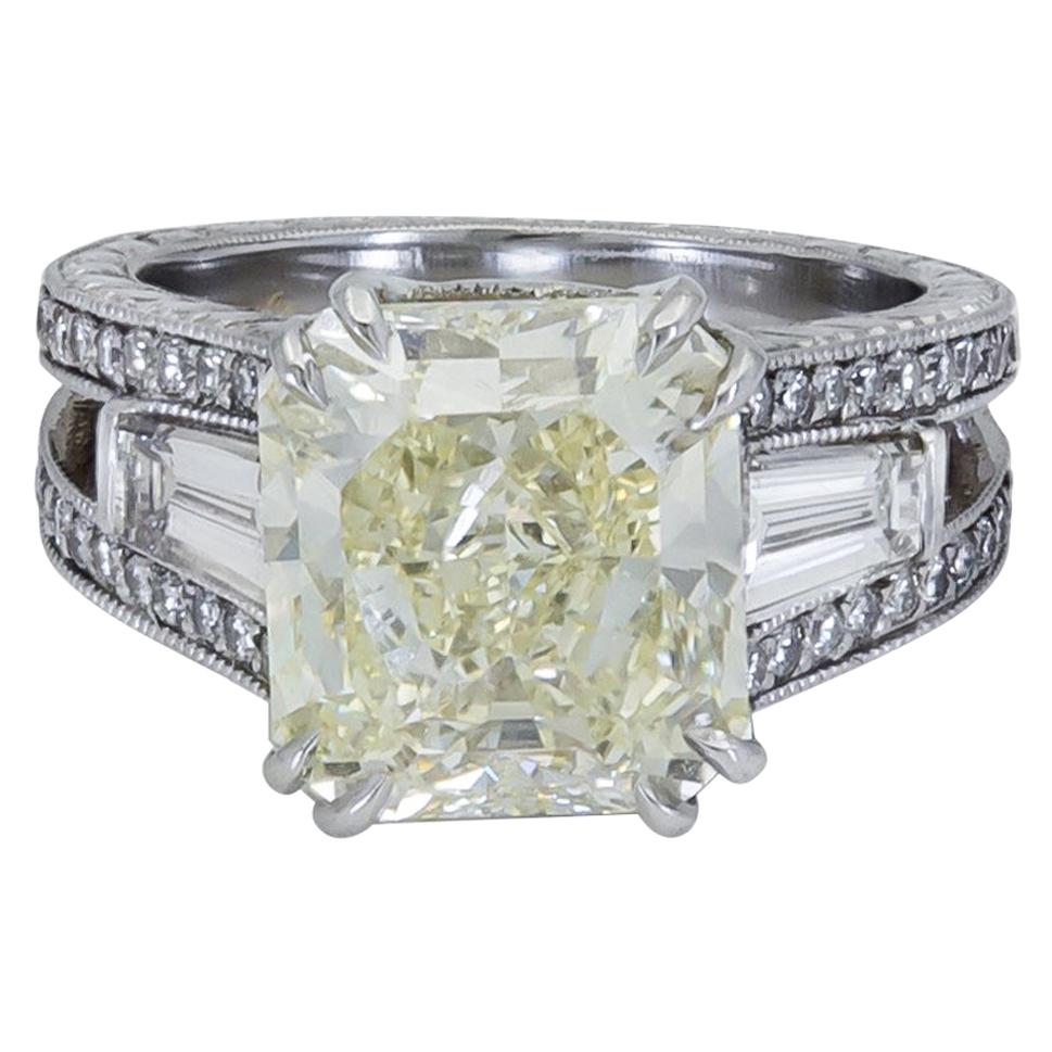 6.07 Carat Radiant Cut Yellow Diamond Three-Stone Engagement Ring