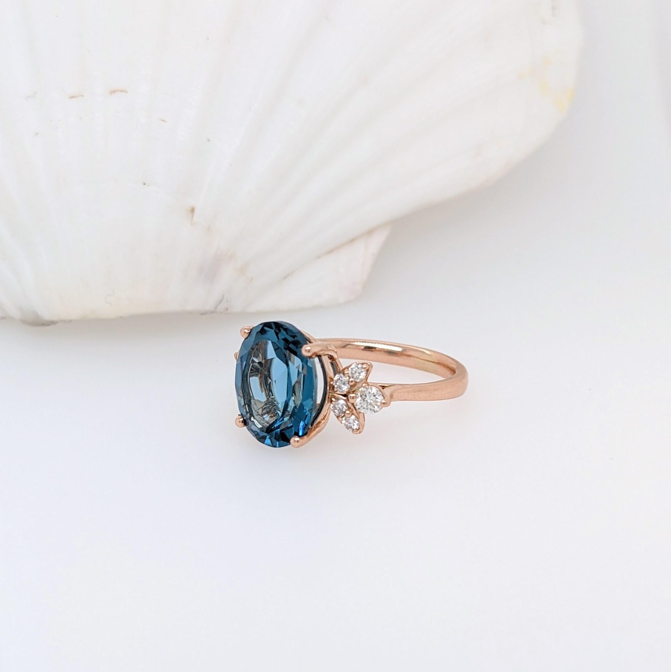 This piece features a gorgeous blue topaz with natural diamond accents in 14k rose gold. A beautiful nature themed design that's works beautifully as an elegant statement piece!

We love this custom NNJ design so much that we've made a full set with