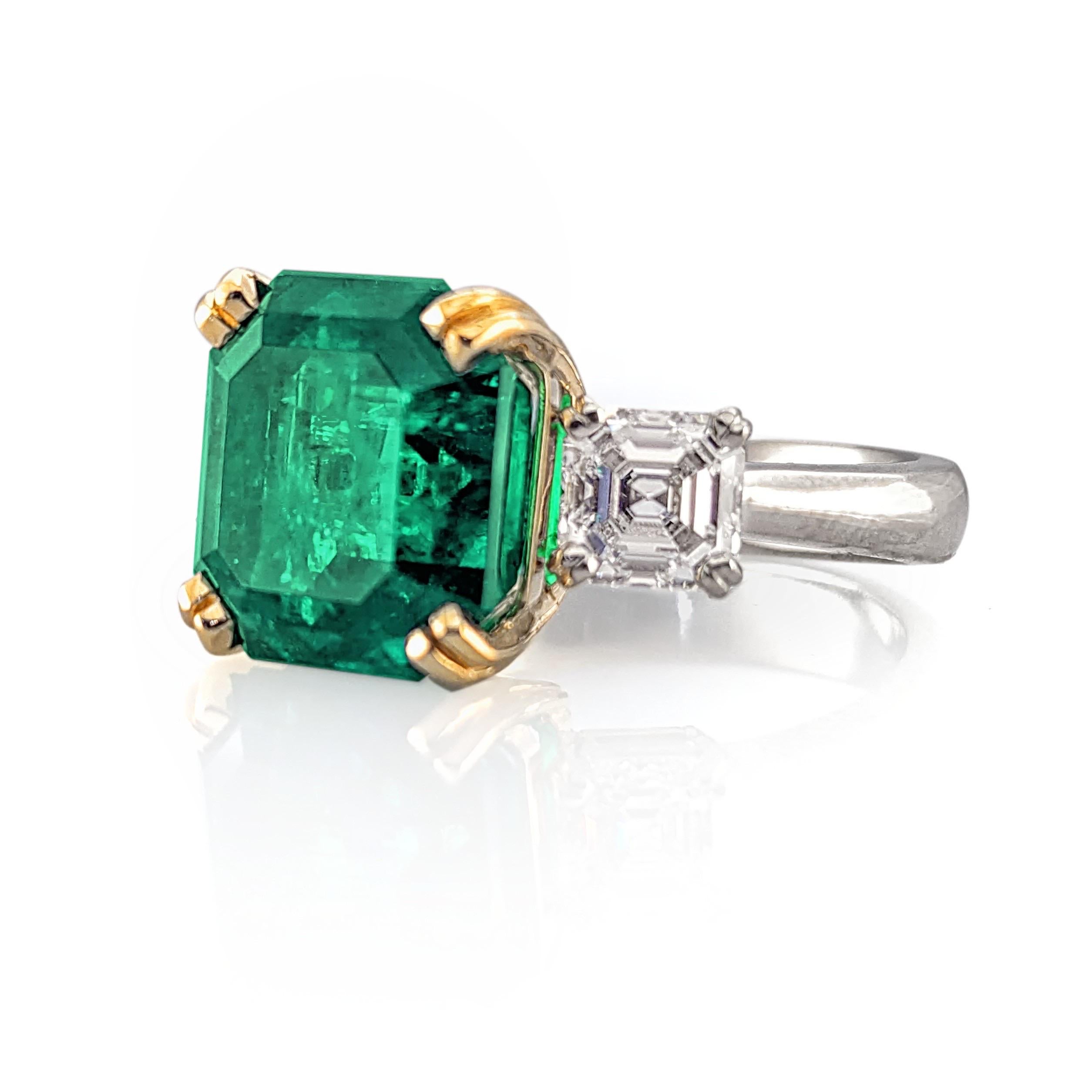An incredibly rare traditional Colombian Emerald and Diamond ring!  The Emerald weighs 6.08 carats.  It is graded by American Gemological Laboratories as Natural Beryl, Colombian origin, and traditional type.  It is set in an eight pronged basket of