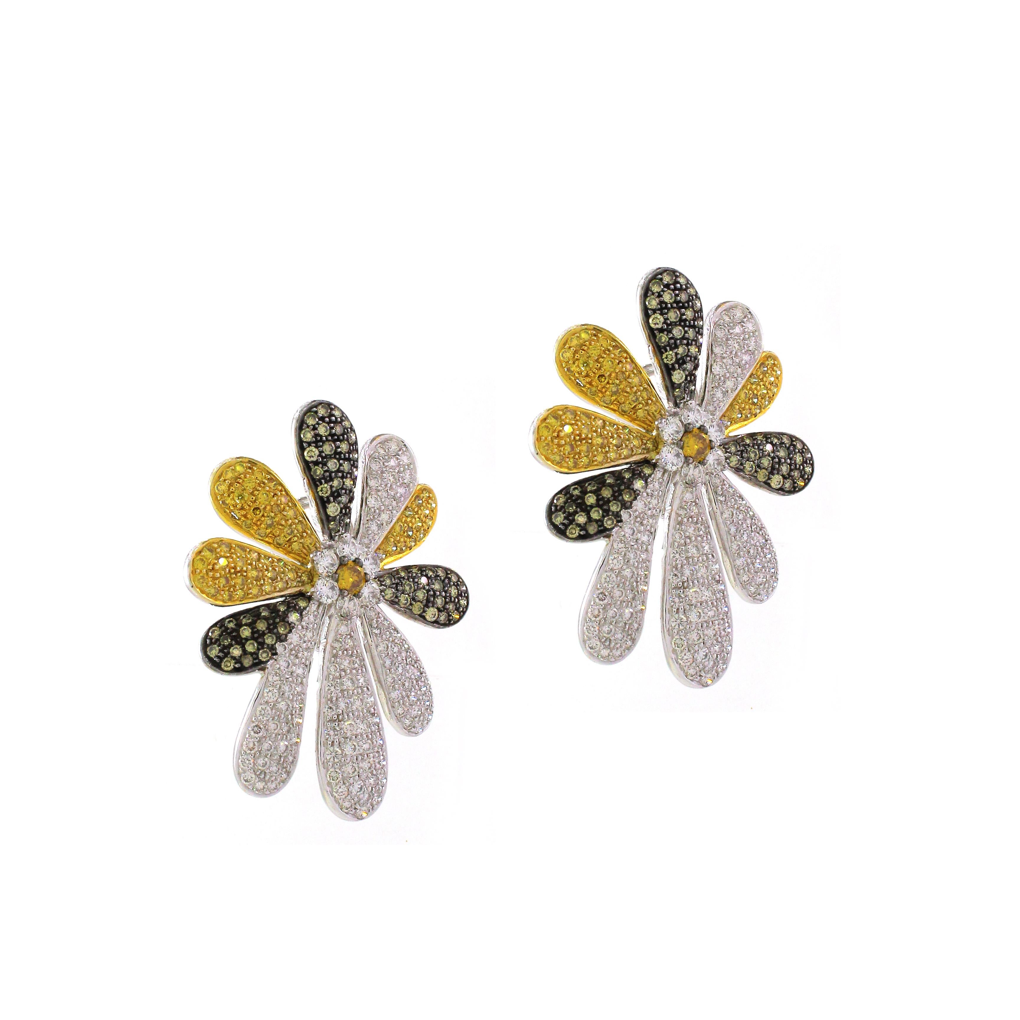 Introducing our stunning Flower-Inspired Stud Earrings, meticulously crafted in luxurious 14K white gold, weighing a total of 22.66 grams. These exquisite earrings are a true celebration of nature's beauty, featuring a mesmerizing array of white and