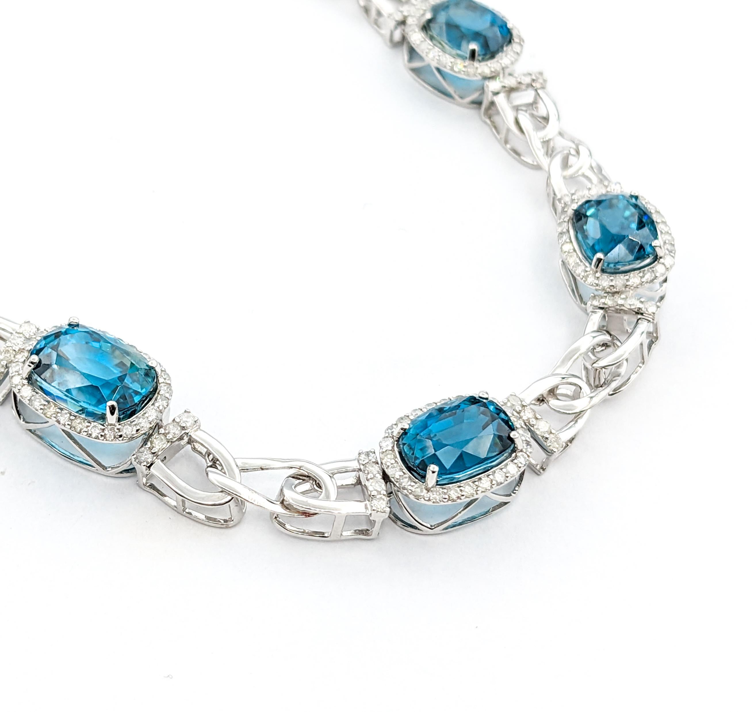 60.81ctw Blue Zircon & 4.53ctw Diamonds Necklace In White Gold

Introducing a stunning Natural Blue Zircon Necklace, exquisitely crafted in 14k White Gold. This luxurious necklace is a true embodiment of elegance and sophistication, featuring