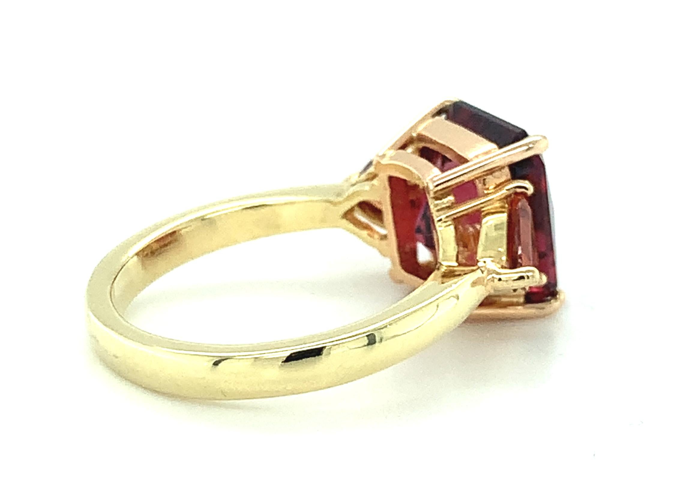 Emerald Cut 6 Carat Red Garnet and Trillion-Cut Spessartite Three-Stone Ring in Yellow Gold  For Sale
