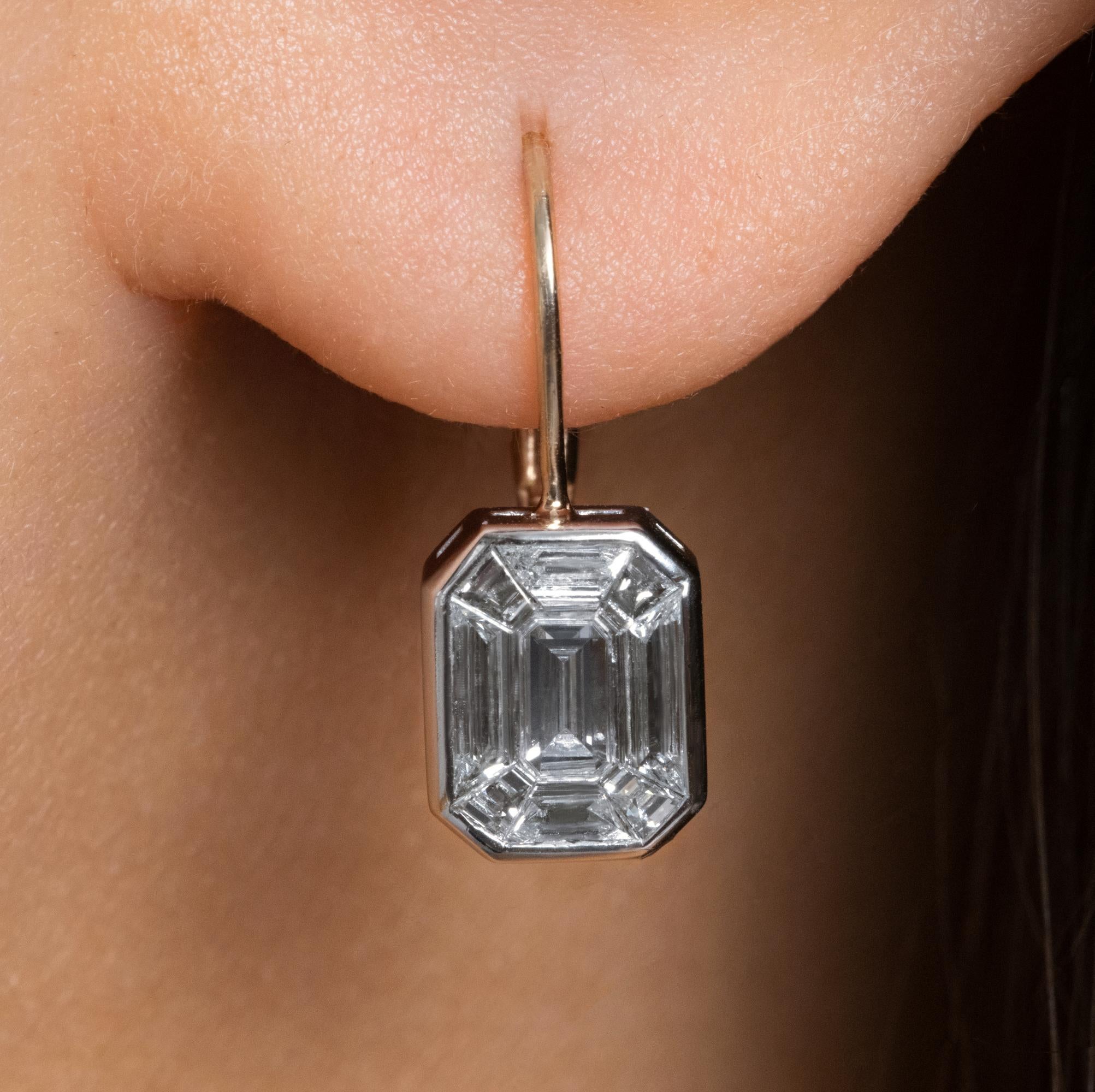 Timeless 18k & Platinum 6.0ct Face Up Solitaire Diamond Drop Earrings in Emerald Cut shape.

One accessory that has never gone out of style is the solitaire diamond earrings...These earrings will be a perfect gift for any occasion. A killer