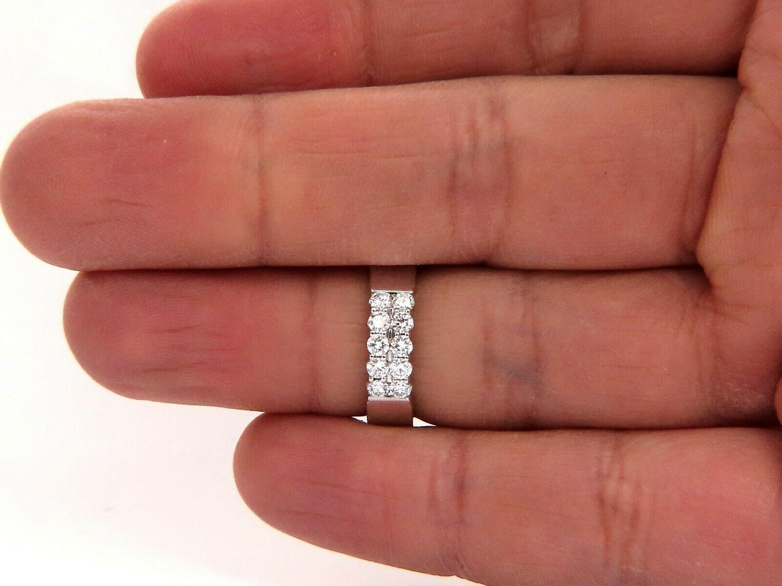 Double Row / Common sharing prong band

.60ct Natural Diamonds

 Full cut, Rounds 

F color, Vs-1 clarity

14kt. white gold

5.2 Grams

5mm wide (top diamond rows)

2.2mm depth

current size: 6.25

We may resize (please inquire).

$3600 appraisal