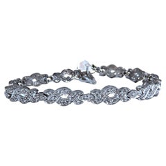 .60ct. Bracelet tennis classique en or blanc 14 carats avec diamants ronds naturels