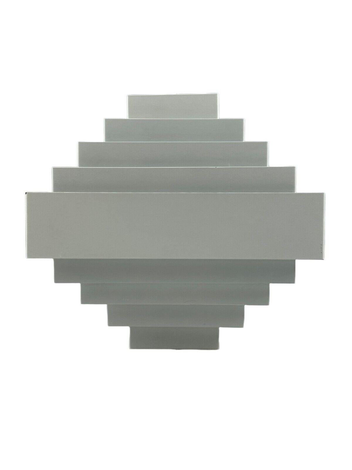 60s 70s wall lamp by Jules Wabbes, AB Madsen & E. Larsen in metal

Object: wall lamp

Manufacturer: Jules Wabbes

Condition: good - vintage

Age: around 1960-1970

Dimensions:

Width = 18cm
Depth = 12.5cm
Height = 17cm

Material: metal

Other