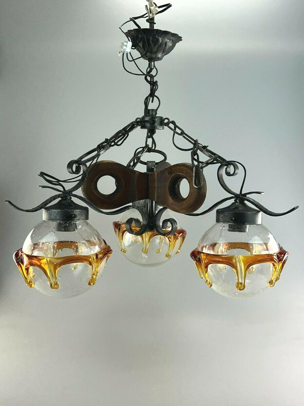 60s 70s Brutalist Ceiling Lamp Hanging Lamp Iron & Murano Glass 60s

Object: ceiling lamp

Manufacturer:

Condition: good - vintage

Age: around 1960-1970

Dimensions:

Diameter 50cm
Height = 55cm

Other notes:

The pictures serve