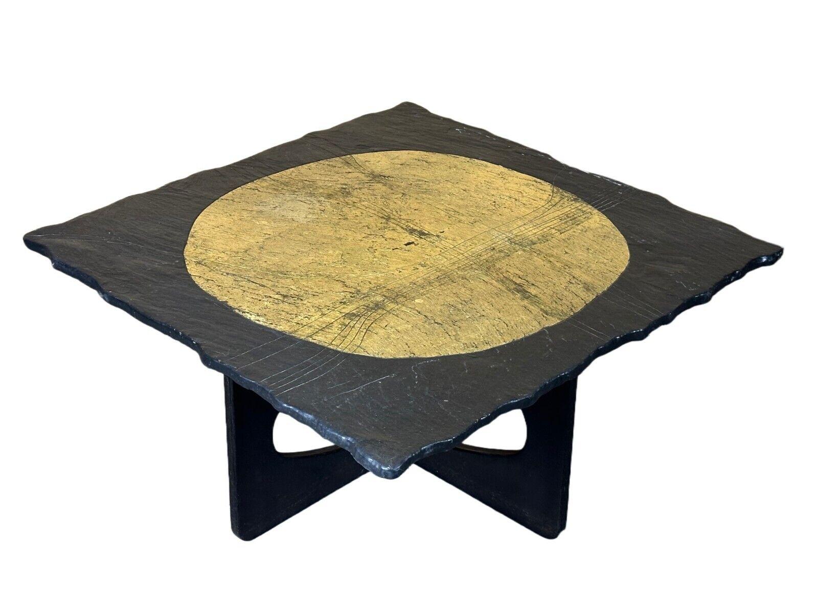60s 70s Brutalist Coffee Table Side Table Slate Top Design

Object: coffee table

Manufacturer:

Condition: good - vintage

Age: around 1960-1970

Dimensions:

Width = 100cm
Depth = 100cm
Height = 47cm

Material: slate, wood

Other notes:

The