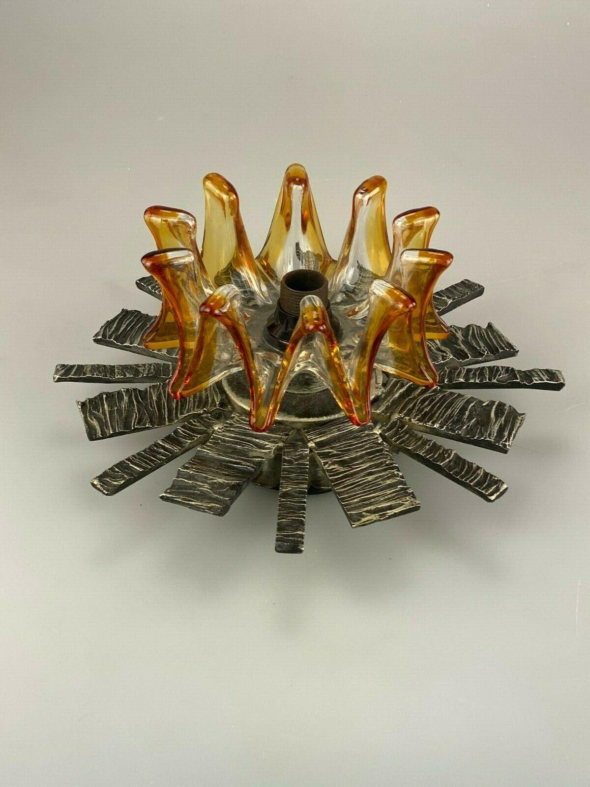 60s 70s Brutalist wall lamp sconce iron & glass wall lamp 60s 70s.

Object: wall lamp

Manufacturer:

Condition: good - vintage

Age: around 1960-1970

Dimensions:

Diameter = 31cm
Height = 14cm

Other notes:

The pictures serve as
