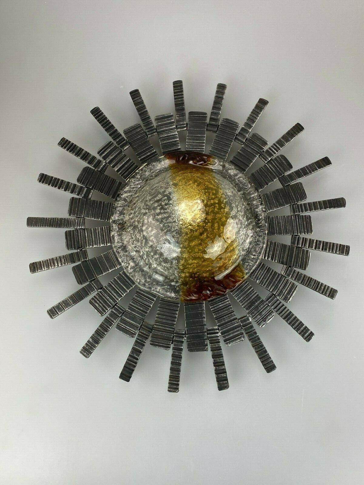 60s 70s Brutalist Wall Lamp Sconce Iron & Glass Wall Lamp 60s 70s

Object: wall lamp

Manufacturer:

Condition: good

Age: around 1960-1970

Dimensions:

Diameter = 48cm
Height = 10cm

Other notes:

The pictures serve as part of the