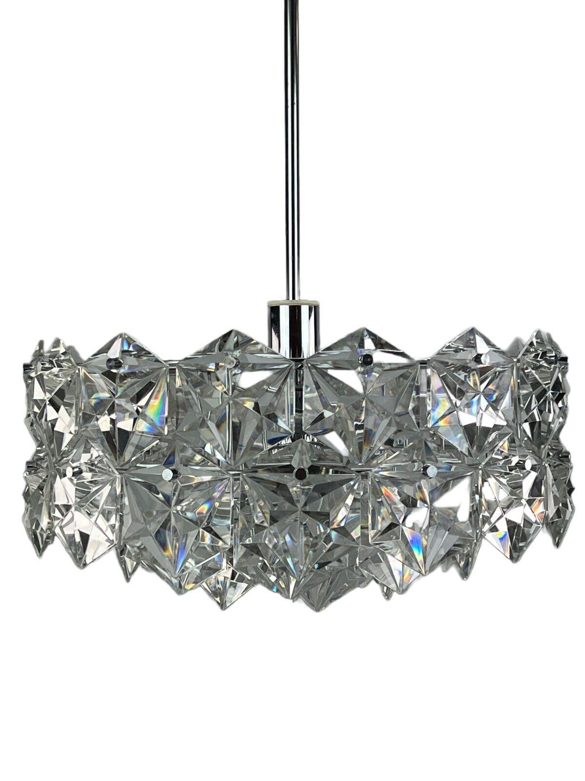 60s 70s Ceiling lamp Chandelier Kinkeldey Space Age 60s 70s.

Object: chandelier

Manufacturer: Kinkeldey

Condition: good

Age: around 1960-1970

Dimensions:

Diameter = 43cm
Height = 60cm

Other notes:

6x E14 socket
1x E27