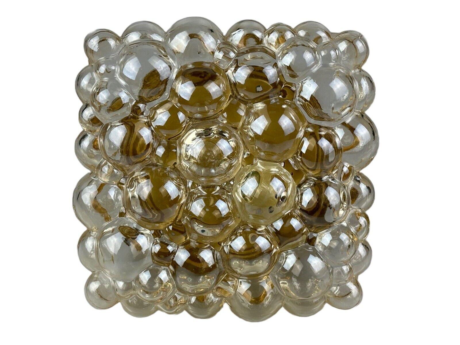 60s 70s ceiling lamp Glashütte Limburg Germany Helena Tynell Bubble

Object: wall lamp

Manufacturer: Glashütte Limburg

Condition: good

Age: around 1960-1970

Dimensions:

Width = 22.5cm
Depth = 22.5cm
Height = 10cm

Material: glass, metal

Other