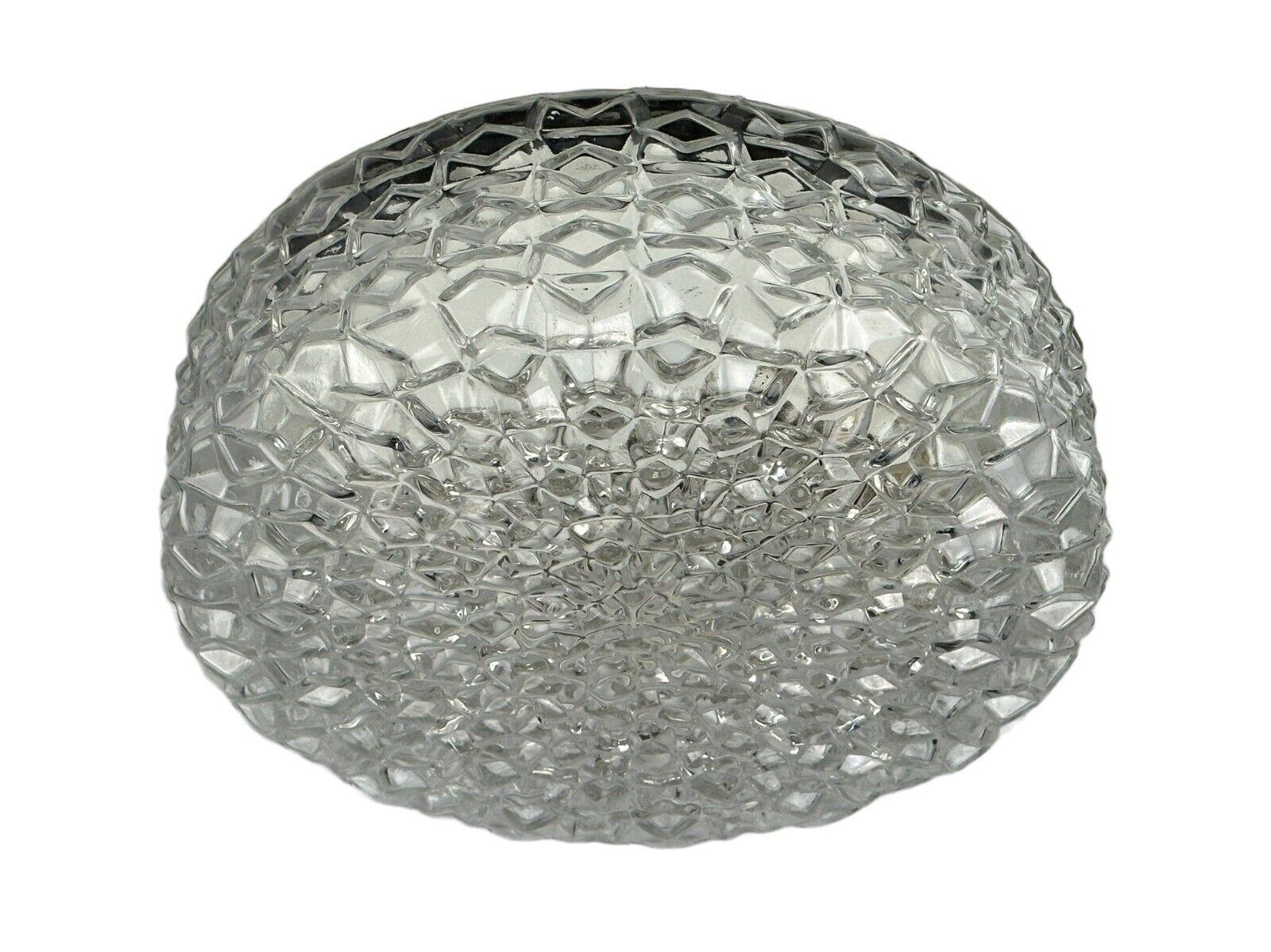 60s 70s ceiling lamp or wall lamp made of glass & metal space age design

Object: ceiling lamp

Manufacturer: RZB

Condition: good - vintage

Age: around 1960-1970

Dimensions:

Diameter = 30cm
Height = 11cm

Material: glass, metal

Other