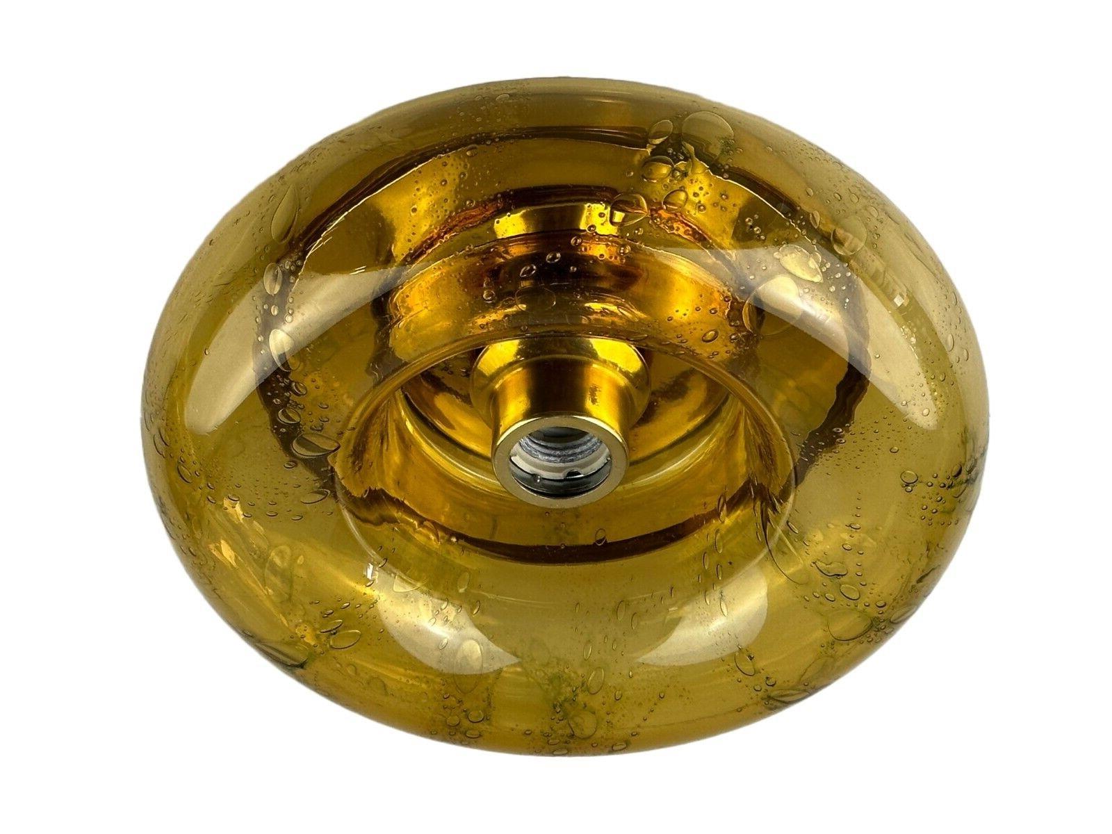 60s 70s ceiling lamp Plafoniere Ice Glas Doria Leuchten Germany Space Age

Object: plafoniere

Manufacturer: Doria lights

Condition: good - vintage

Age: around 1960-1970

Dimensions:

Diameter = 27.5cm
Height = 10cm

Other notes:

E27 socket

The