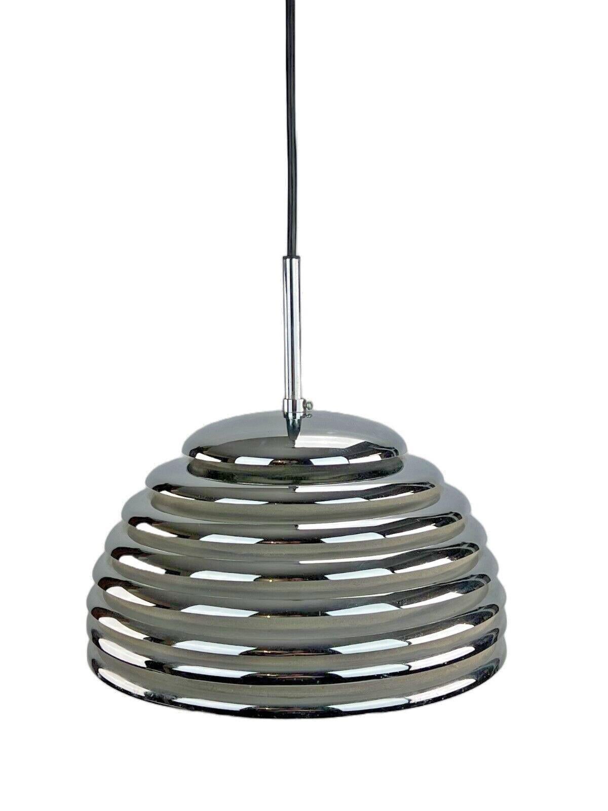 60s 70s ceiling lamp staff lights Kazuo Motozawa Saturno chrome design.

Object: Ceiling lamp

Manufacturer: Staff lights

Condition: Good

Age: Around 1960-1970

Dimensions:

Diameter = 30cm
Height = 28.5cm

Other notes:

E27