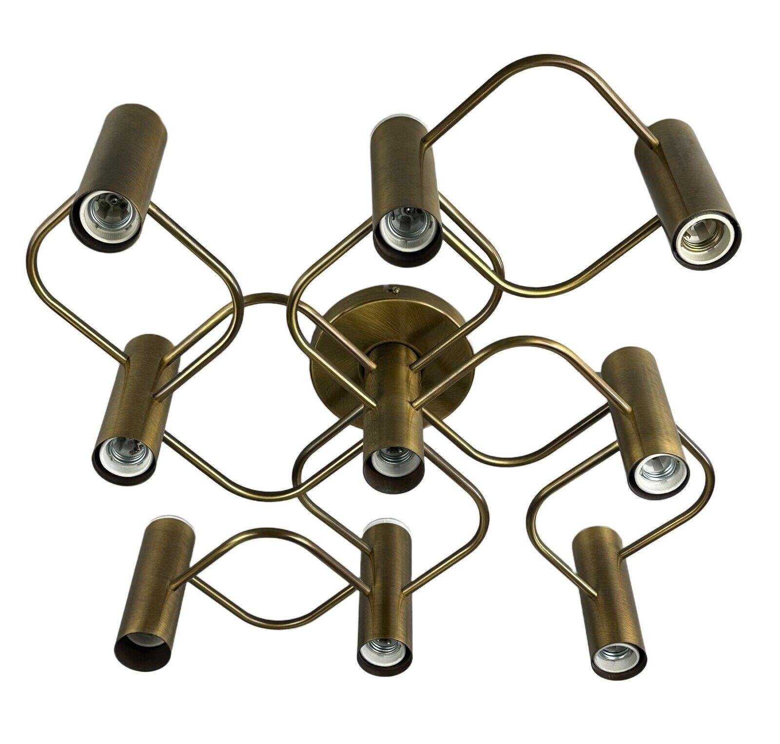 60s 70s ceiling lamp wall lamp Leola Leuchten Germany brass Space Age

Object: ceiling lamp

Manufacturer: Leola Lights

Condition: good

Age: around 1960-1970

Dimensions:

Width = 60cm
Depth = 60cm
Height = 17cm

Other notes:

9x E27 socket

The