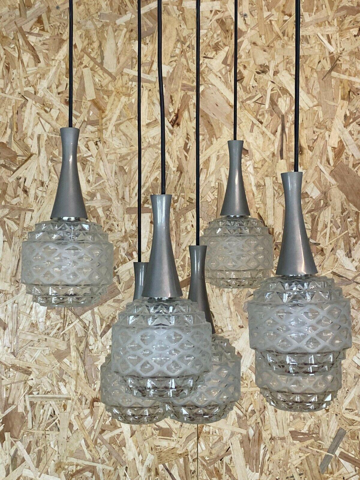60s 70s ceiling light hanging lamp cascade lamp glass Space Age Design 70s

Object: cascade lamp

Manufacturer:

Condition: good

Age: around 1960-1970

Dimensions:

Diameter = 47cm
Height = 90cm

Other notes:

The pictures serve as