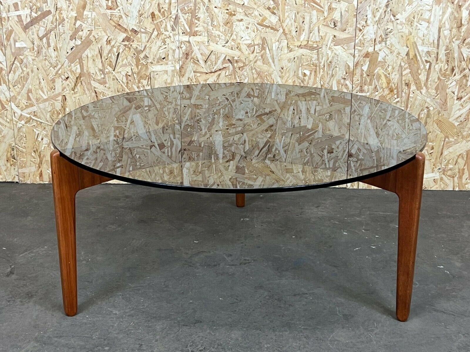 60s 70s Coffee Table Sven Ellekaer Christian Linneberg Teak

Object: coffee table

Manufacturer: Ellekaer / Linneberg

Condition: good

Age: around 1960-1970

Dimensions:

Diameter = 100cm
Height = 45.5cm

Other notes:

The pictures