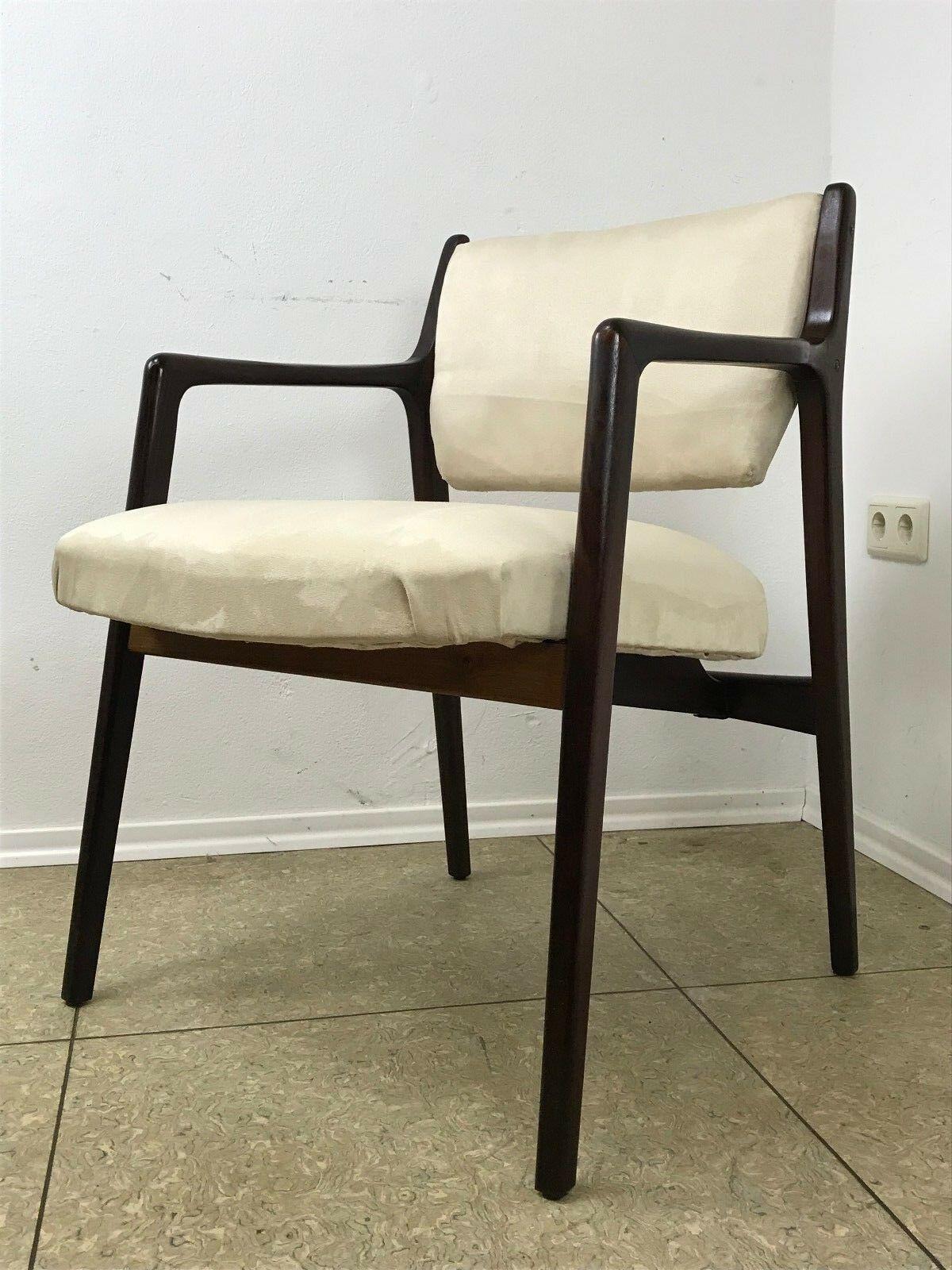 60s 70s dining chair arm chair Danish Design Teak Denmark 60s

Object: armchair

Manufacturer:

Condition: good

Age: around 1960-1970

Dimensions:

60cm x 87cm x 81cm
Seat height = 49cm

Other notes:

The pictures serve as part of