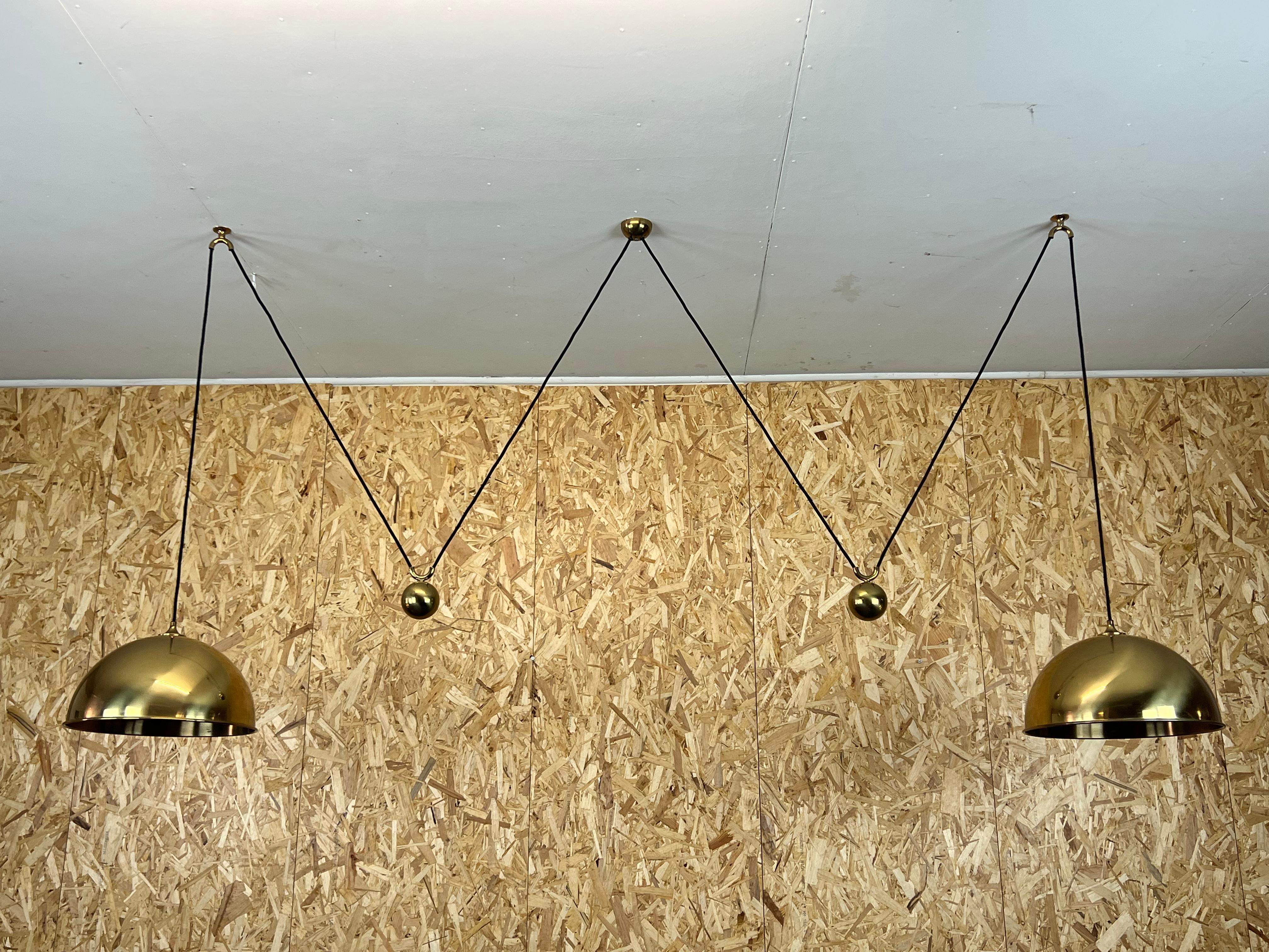 60s 70s Florian Schulz Vintage Double Counterbalance brass design pendant lamp

Object: ceiling lamp

Manufacturer: Florian Schulz

Condition: good - vintage

Age: around 1960-1970

Dimensions:

Width = 230cm
Depth = 37.5cm
Height =