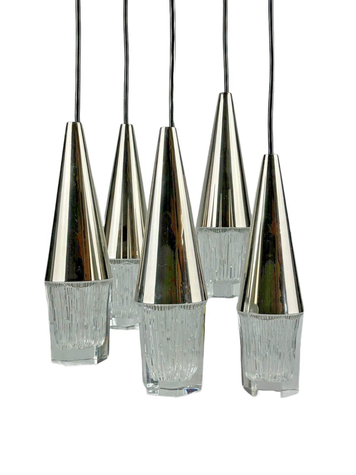 60s 70s hanging lamp cascade lamp 5 lights glass & chrome space age design

Object: cascade lamp

Manufacturer:

Condition: good

Age: around 1960-1970

Dimensions:

Diameter = 35cm
Height = 110cm

Other notes:

5x E14 socket

The pictures serve as