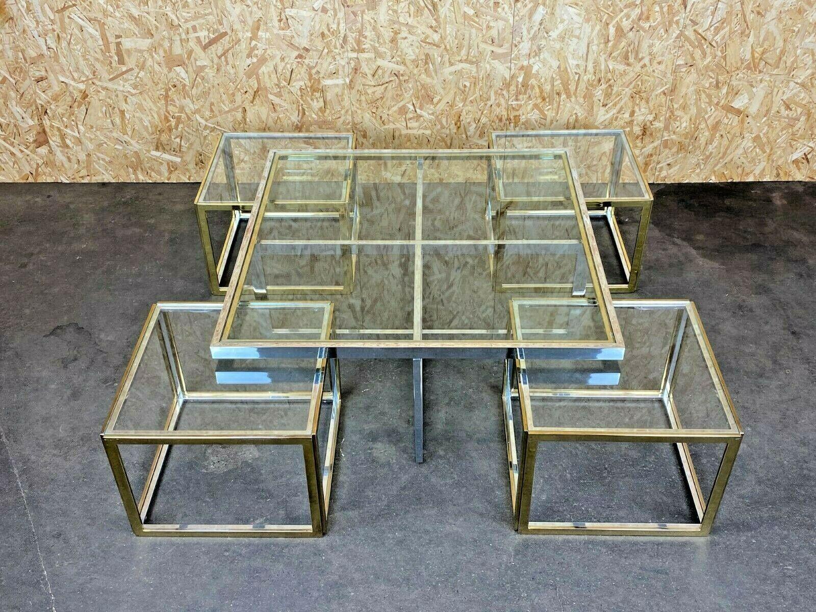 60s 70s Jean Charles Maison huge coffee table chrome & brass 4 nesting tables

Object: coffee table

Manufacturer: Maison Charles

Condition: good - vintage

Age: around 1960-1970

Dimensions:

104cm x 104cm x 44cm

Other notes:

The