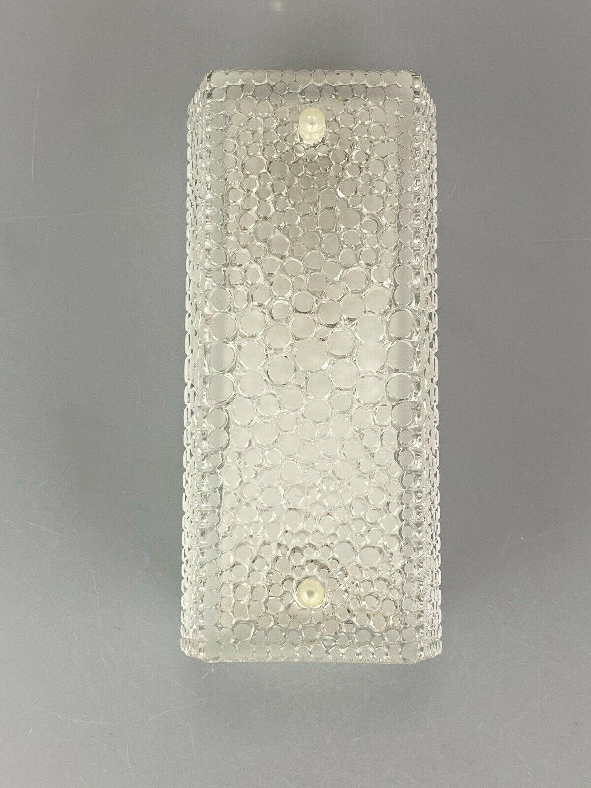 60s 70s Lamp fixture wall sconce wall lamp ice glass space age design

Object: wall lamp

Manufacturer:

Condition: good

Age: around 1960-1970

Dimensions:

22cm x 10cm x 7cm

Other notes:

The pictures serve as part of the