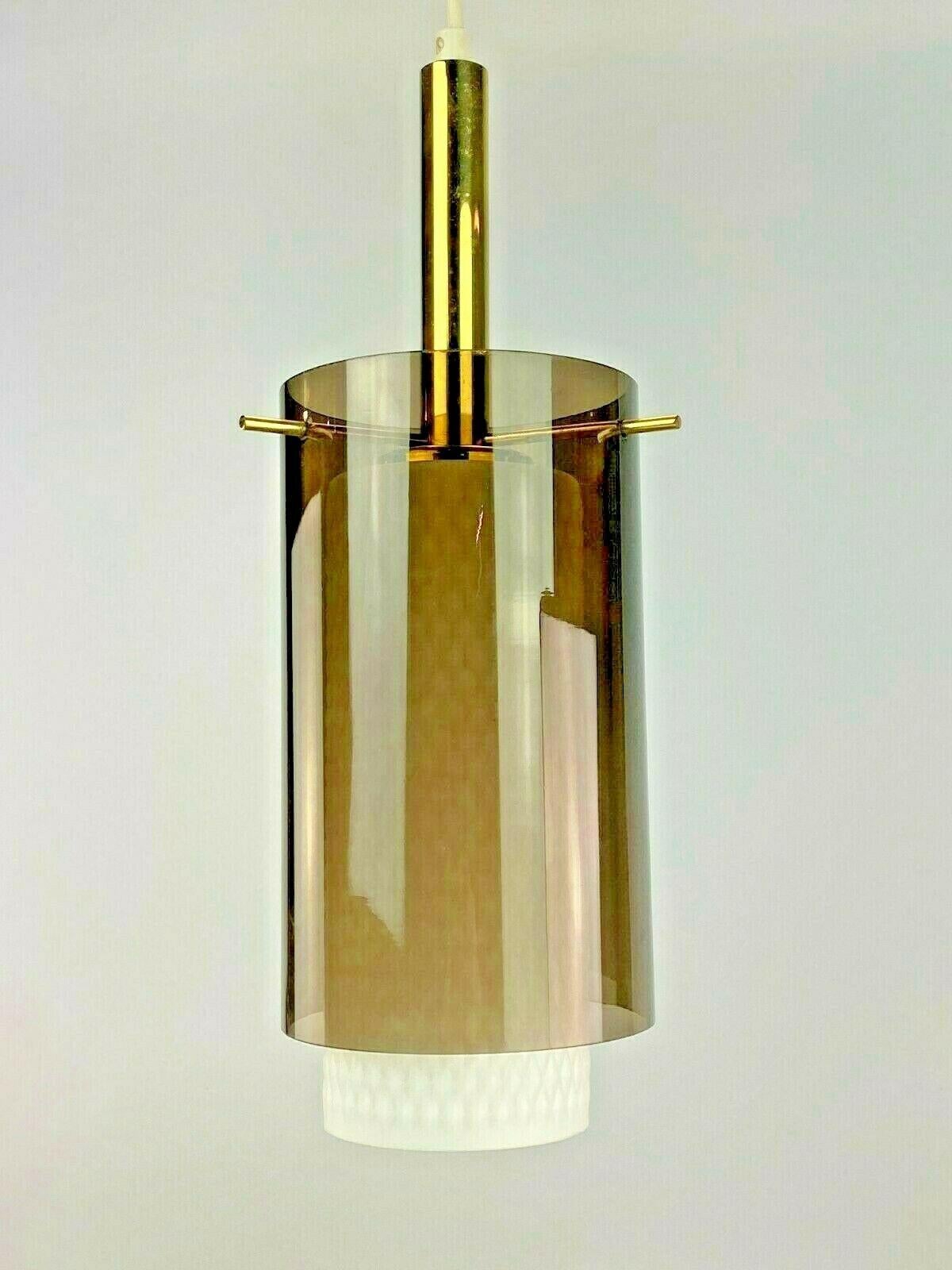 60s 70s lamp light ceiling lamp brass glass space age design 60s

Object: ceiling lamp

Manufacturer:

Condition: good

Age: around 1960-1970

Dimensions:

Diameter = 13cm
Height = 39cm

Other notes:

The pictures serve as part of
