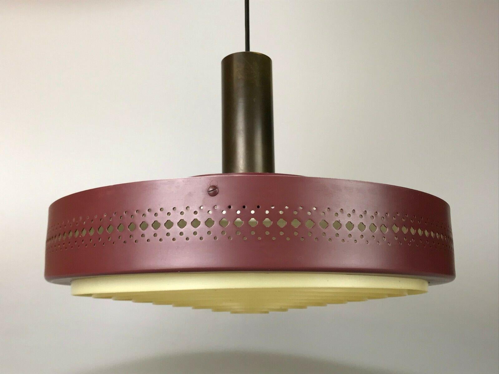 60s 70s Lamp light ceiling lamp sheet metal Space Age Danish Denmark design.

Object: ceiling lamp

Manufacturer: Fog & Morup

Condition: good

Age: around 1960-1970

Dimensions:

Diameter = 38cm
Hanging height = 61cm

Other